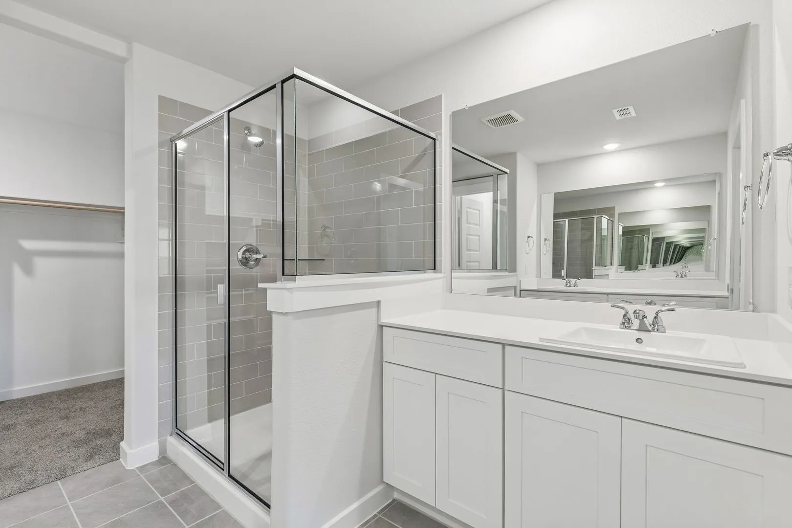 Primary Bathroom in the Harrison home plan by Trophy Signature Homes – REPRESENTATIVE PHOTO