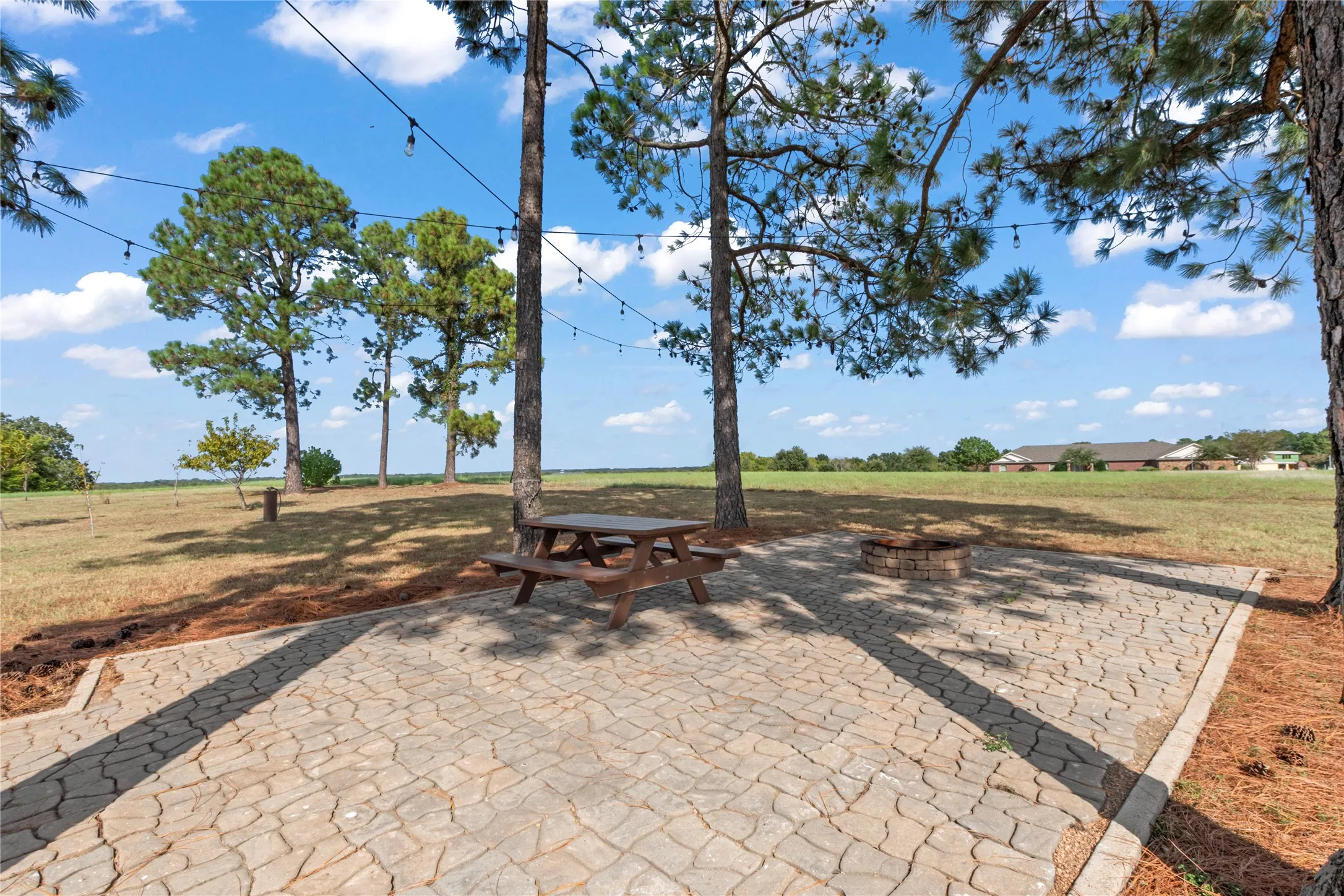 Patio with fire pit  with a great breeze and view