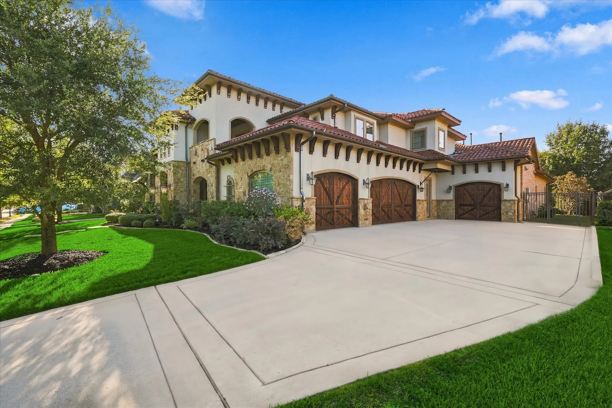 4 car garage. All garages finished off by Garage Living, with design, craftmanship & functionality: Floortex floors and high-end steel cabinets and workspaces