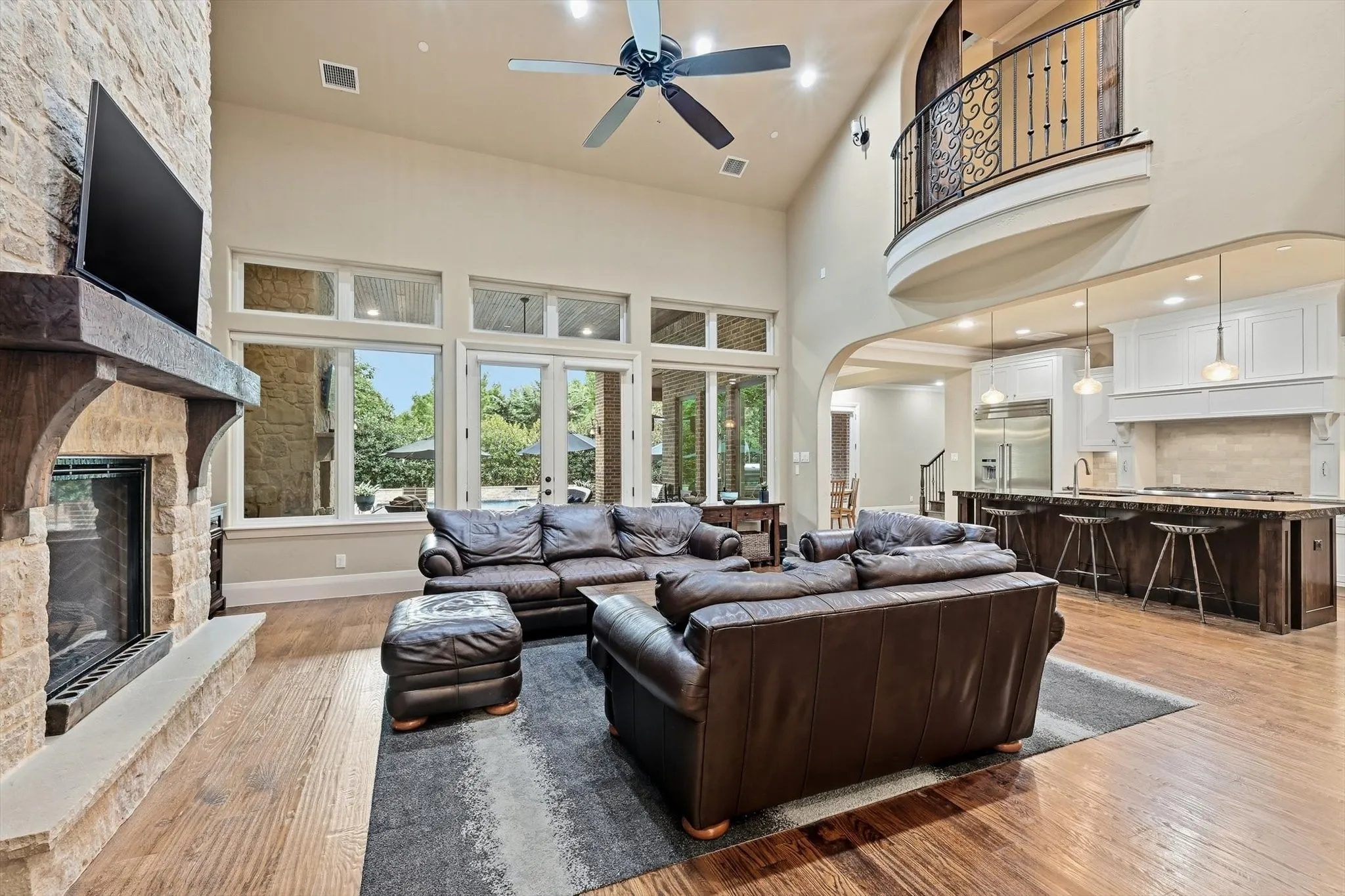 Tall ceilings (20 ft) with windows all around.