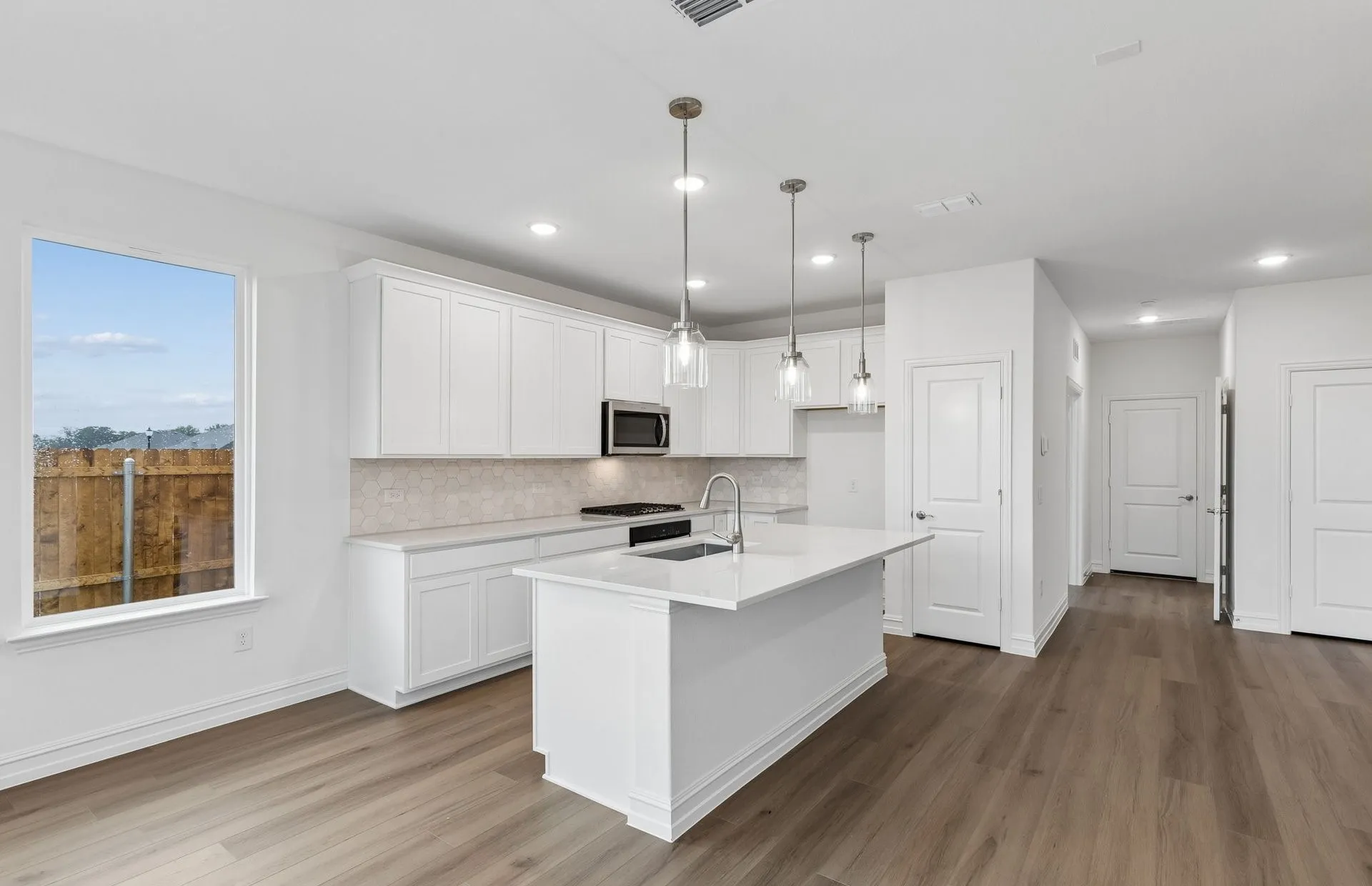 *Floorplan representation, not actual home - Large island overlooking gathering room and dining areas
