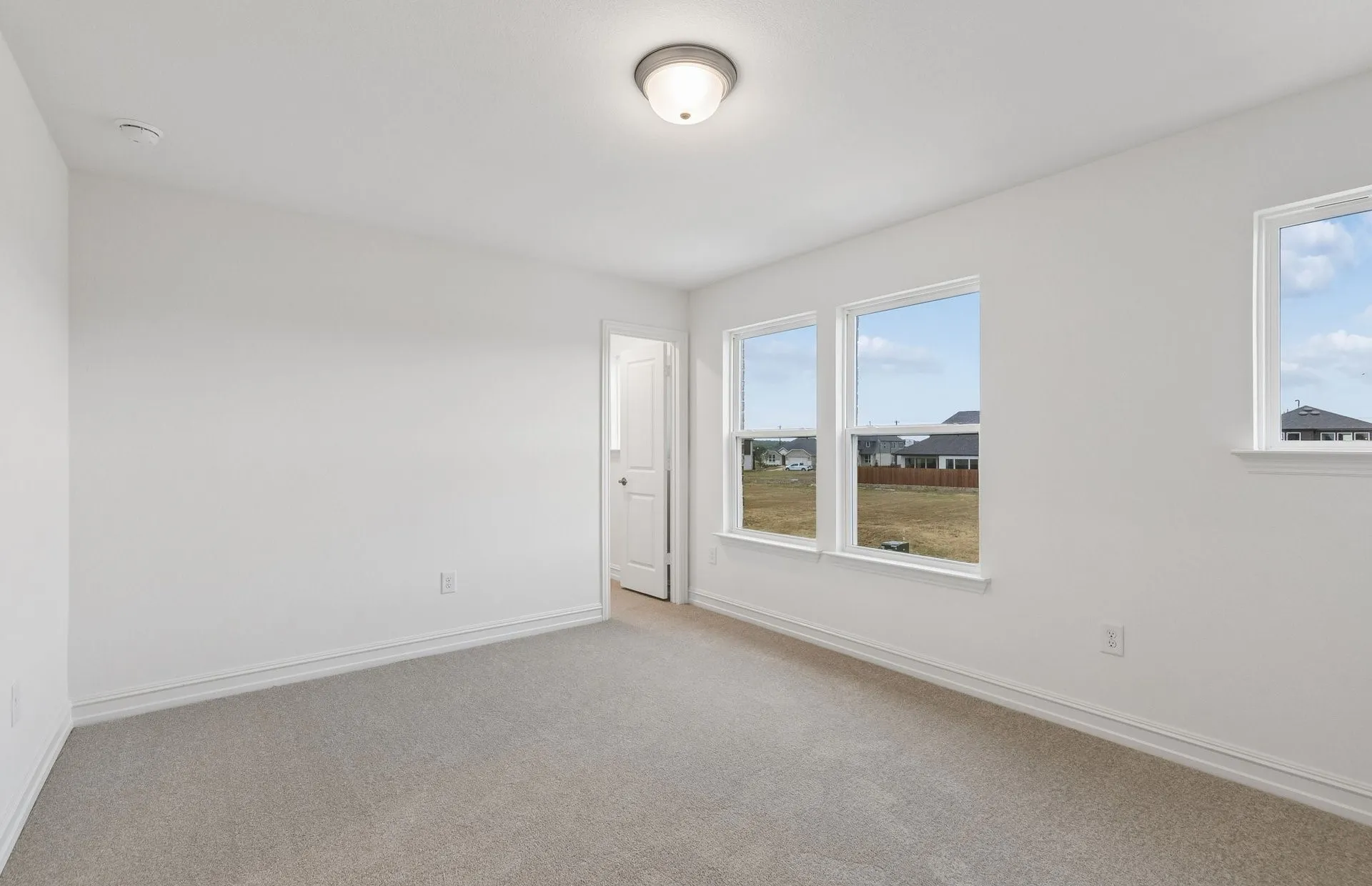 *Floorplan representation, not actual home - Spacious secondary bedroom with large windows