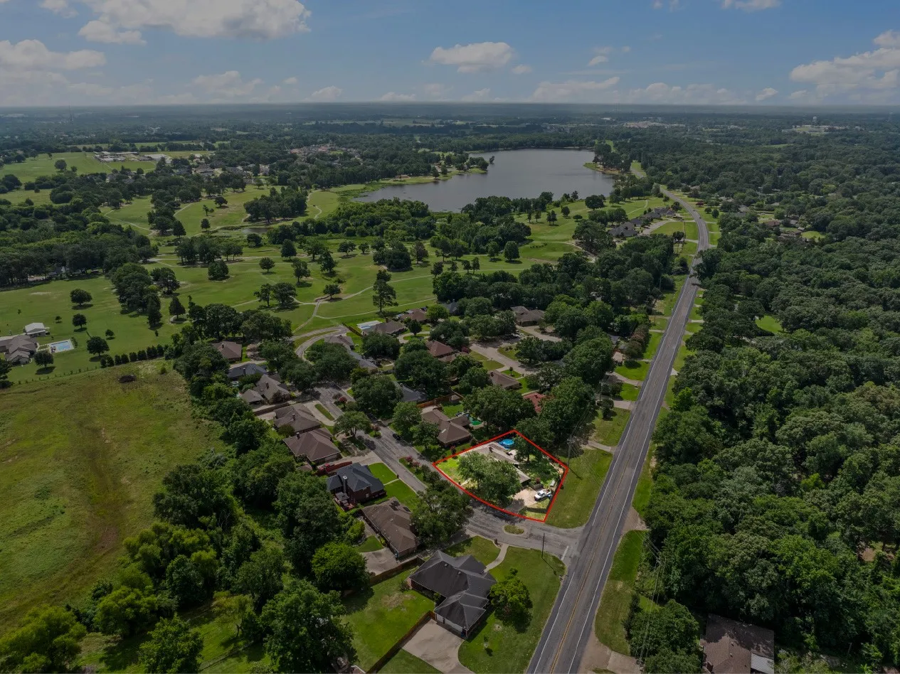 View of property location featuring a nearby body of water and property boundaries highlighted