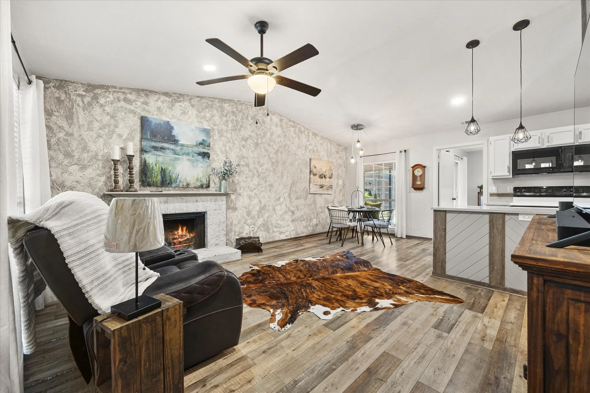 Wood-finish Luxury Vinyl Plank flooring throughout