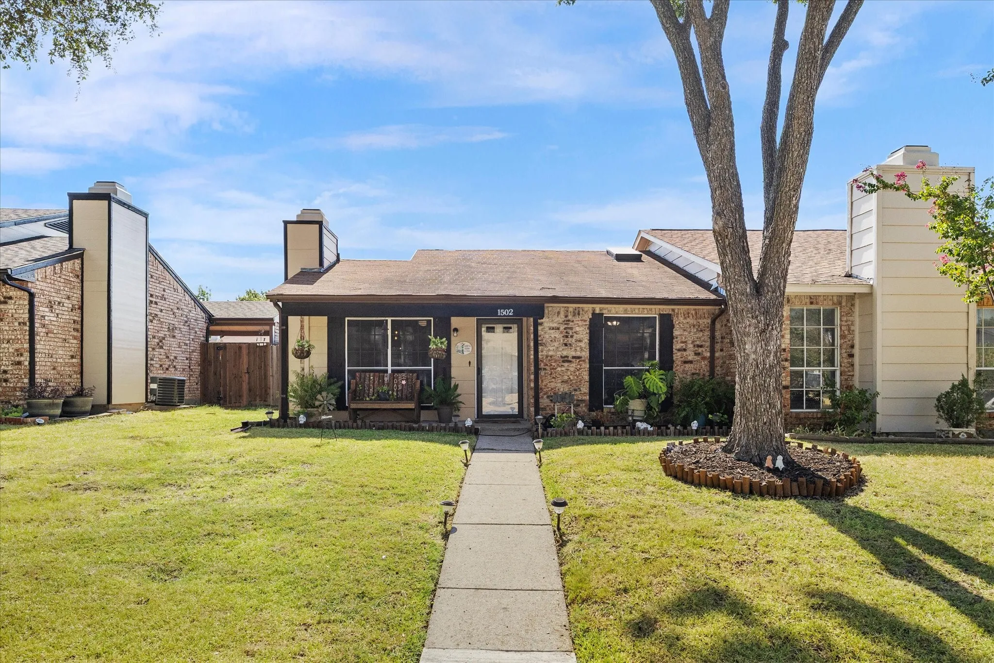 Brick facade with contrasting dark trim