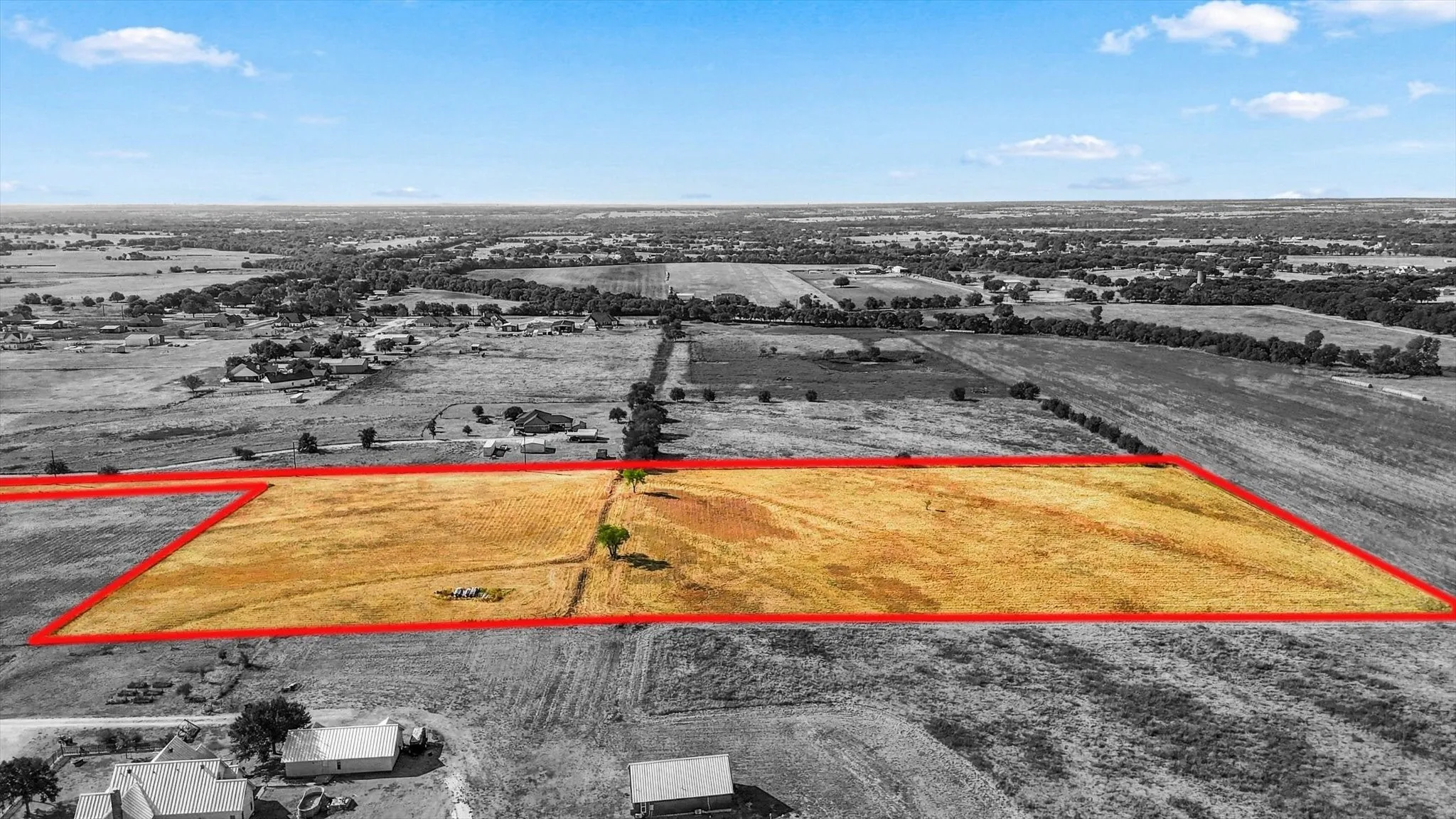 Expansive undeveloped land featuring a rural setting and mature vegetation