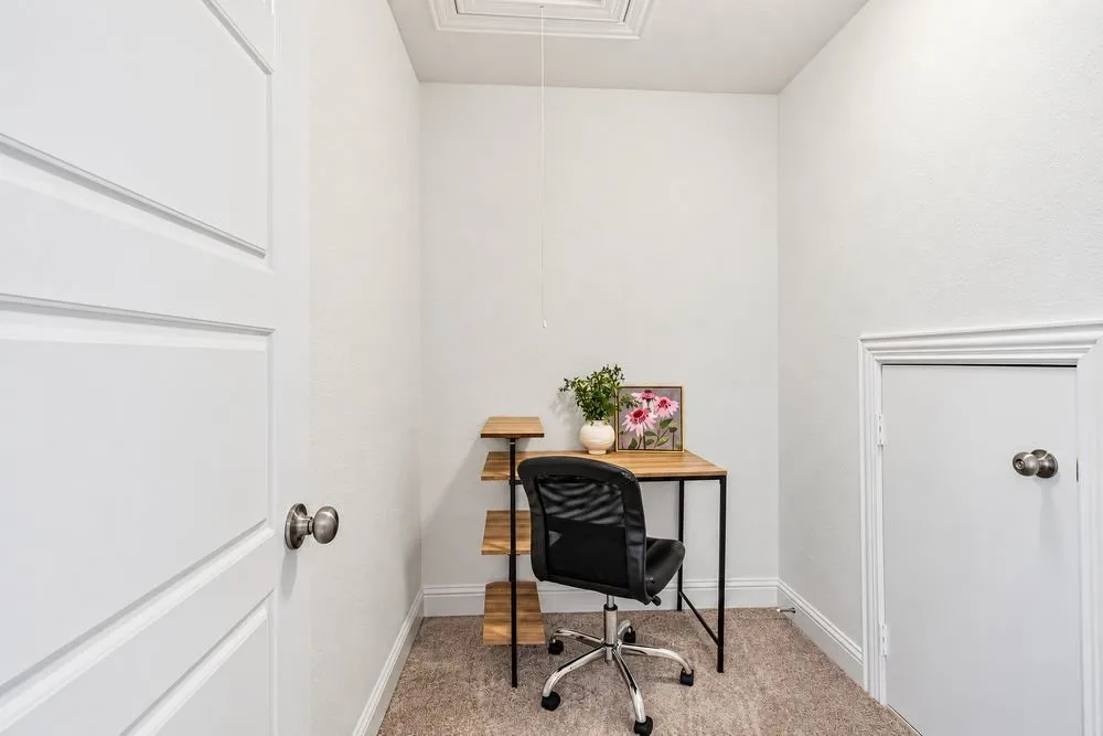 Niche office upstairs or storage or small craft area.
