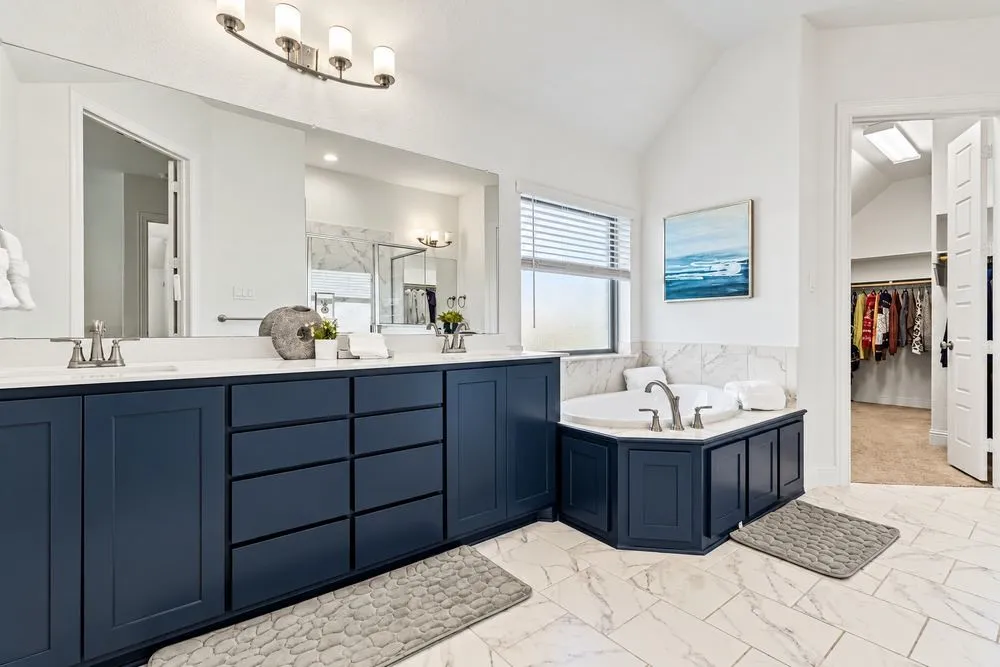 Primary bathroom with garden tub and...