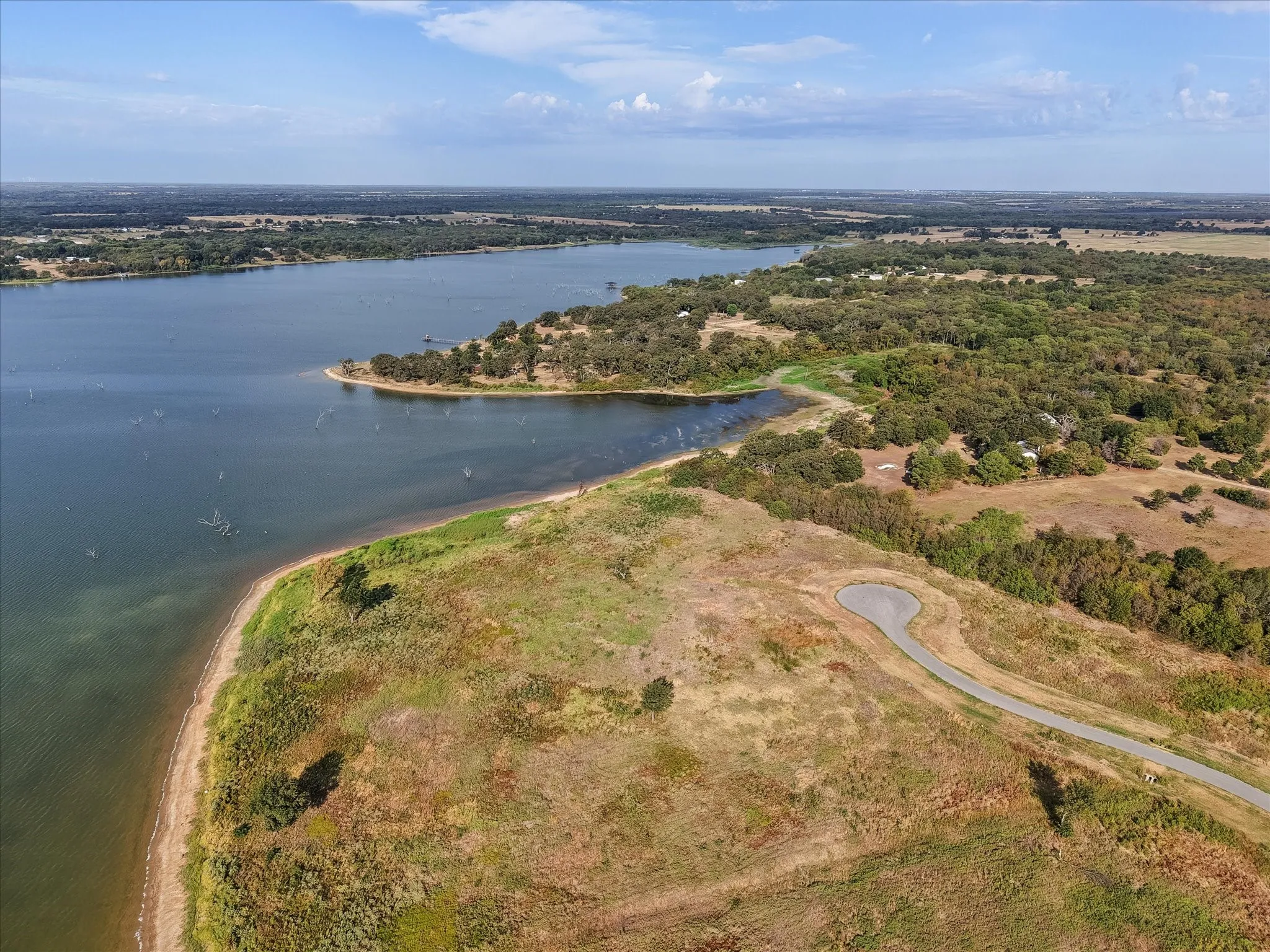 Expansive lakefront property with a paved cul-de-sac