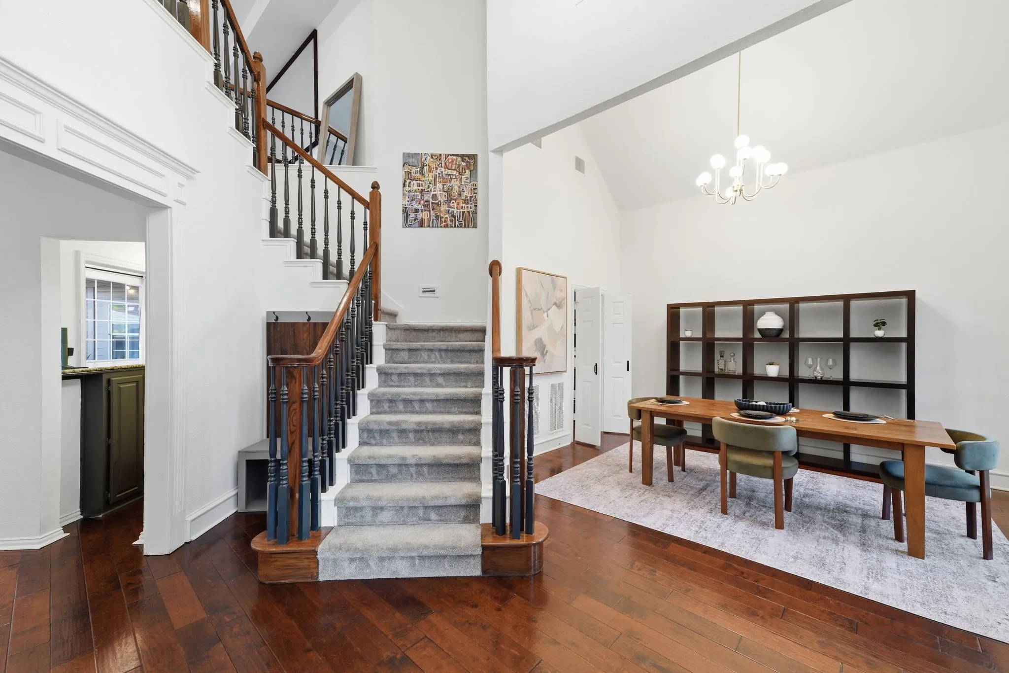 Grand staircase and vaulted ceilings.