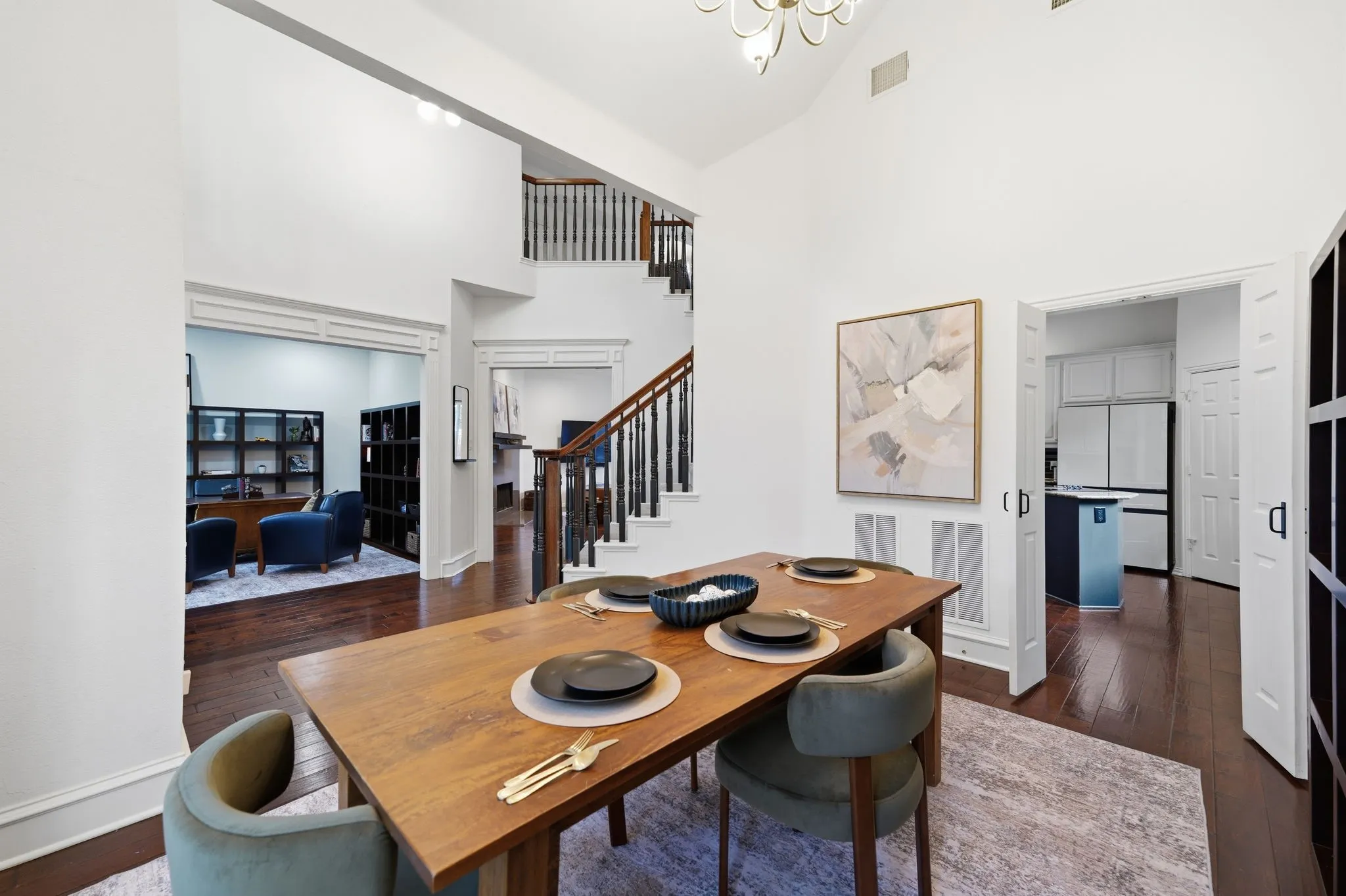 Formal dining with vaulted ceilings.