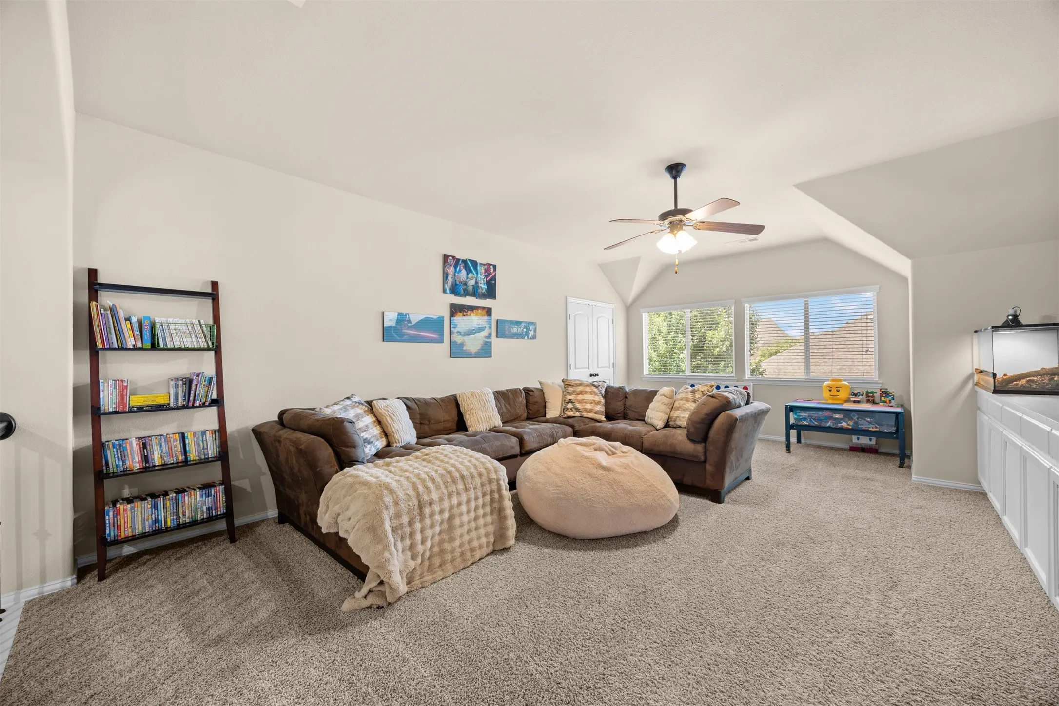 Large upstairs game room adds valuable flexible living space separate from the main family room.