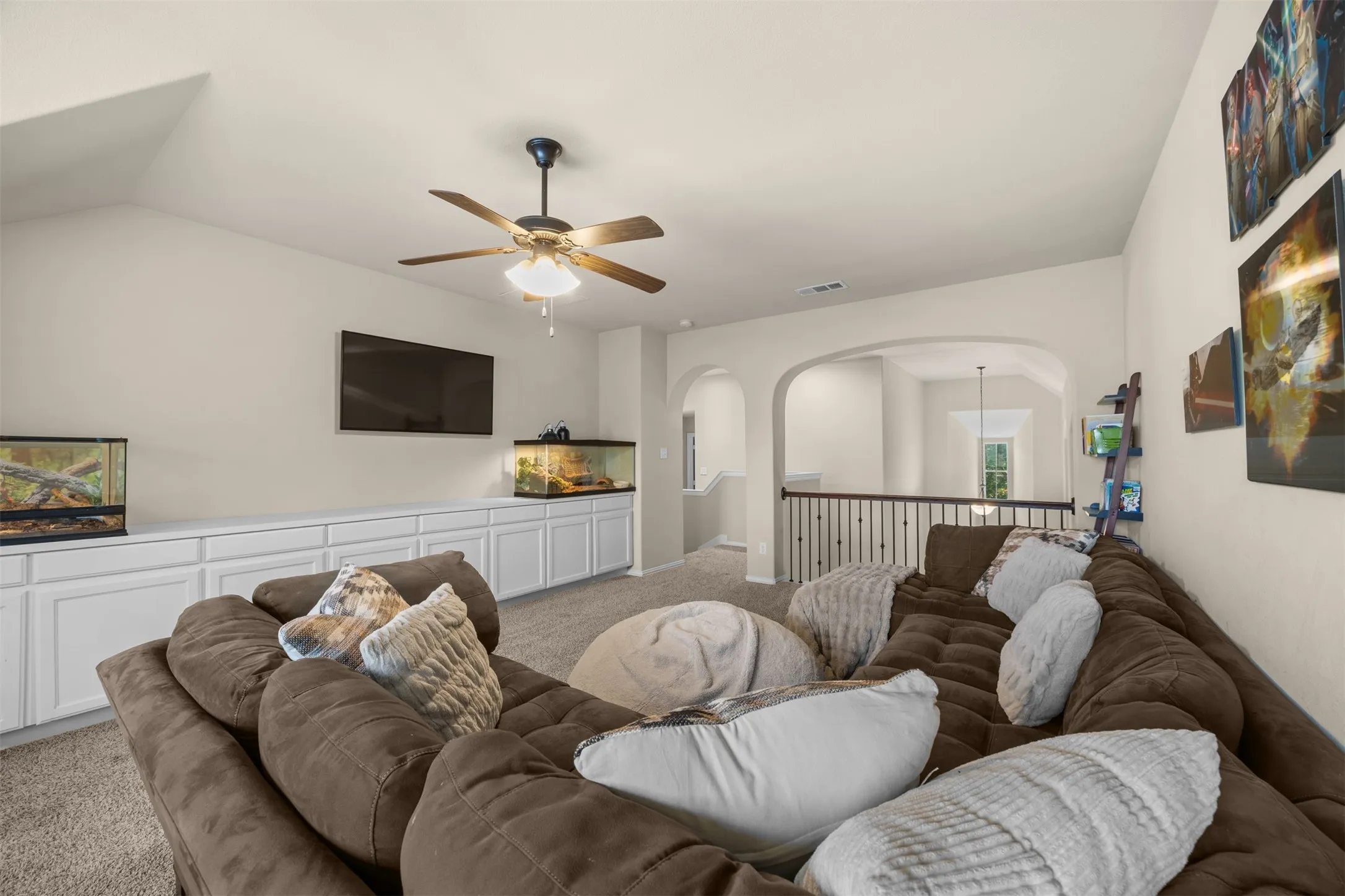 Large upstairs game room adds valuable flexible living space separate from the main family room.