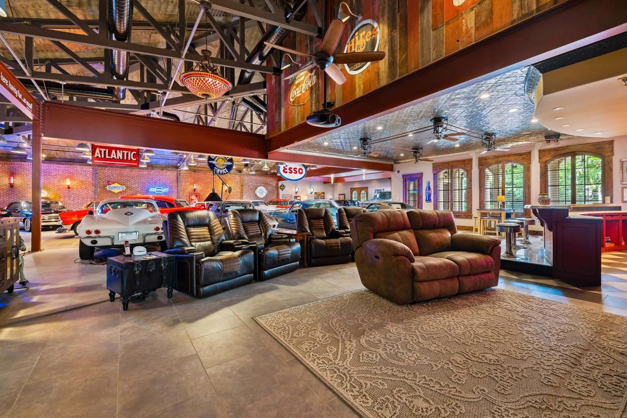 Climate controlled 25 car garage has living area with bar