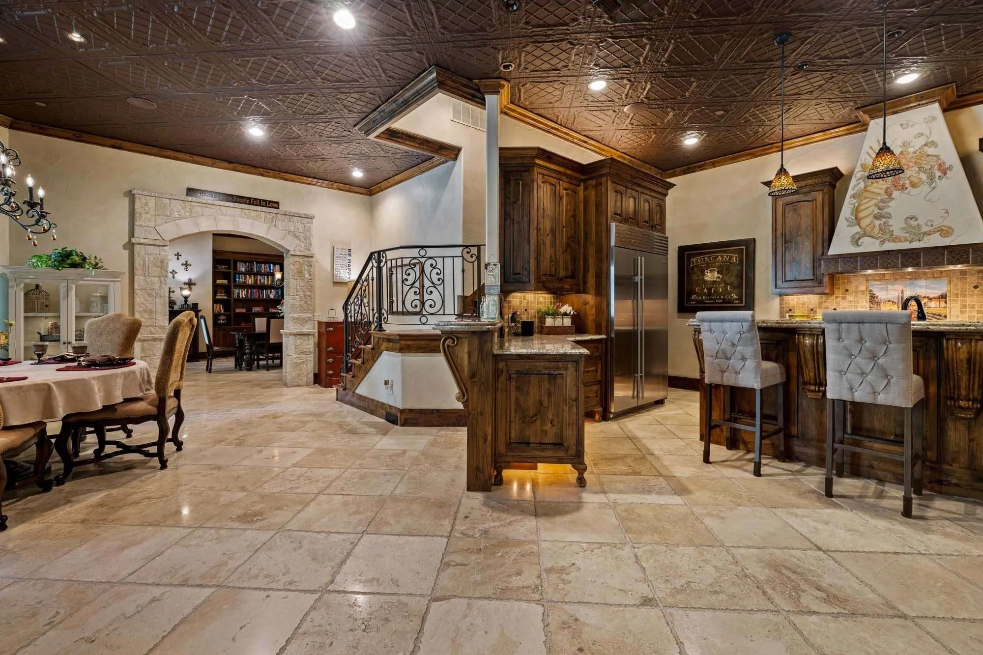 Travertine floors and luxury architectural designs throughout