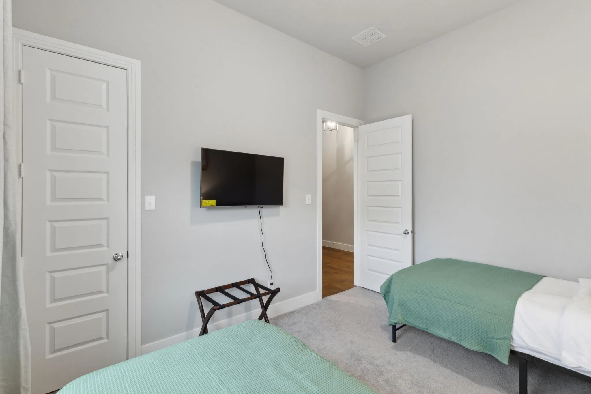 Light gray wall color with white trim
