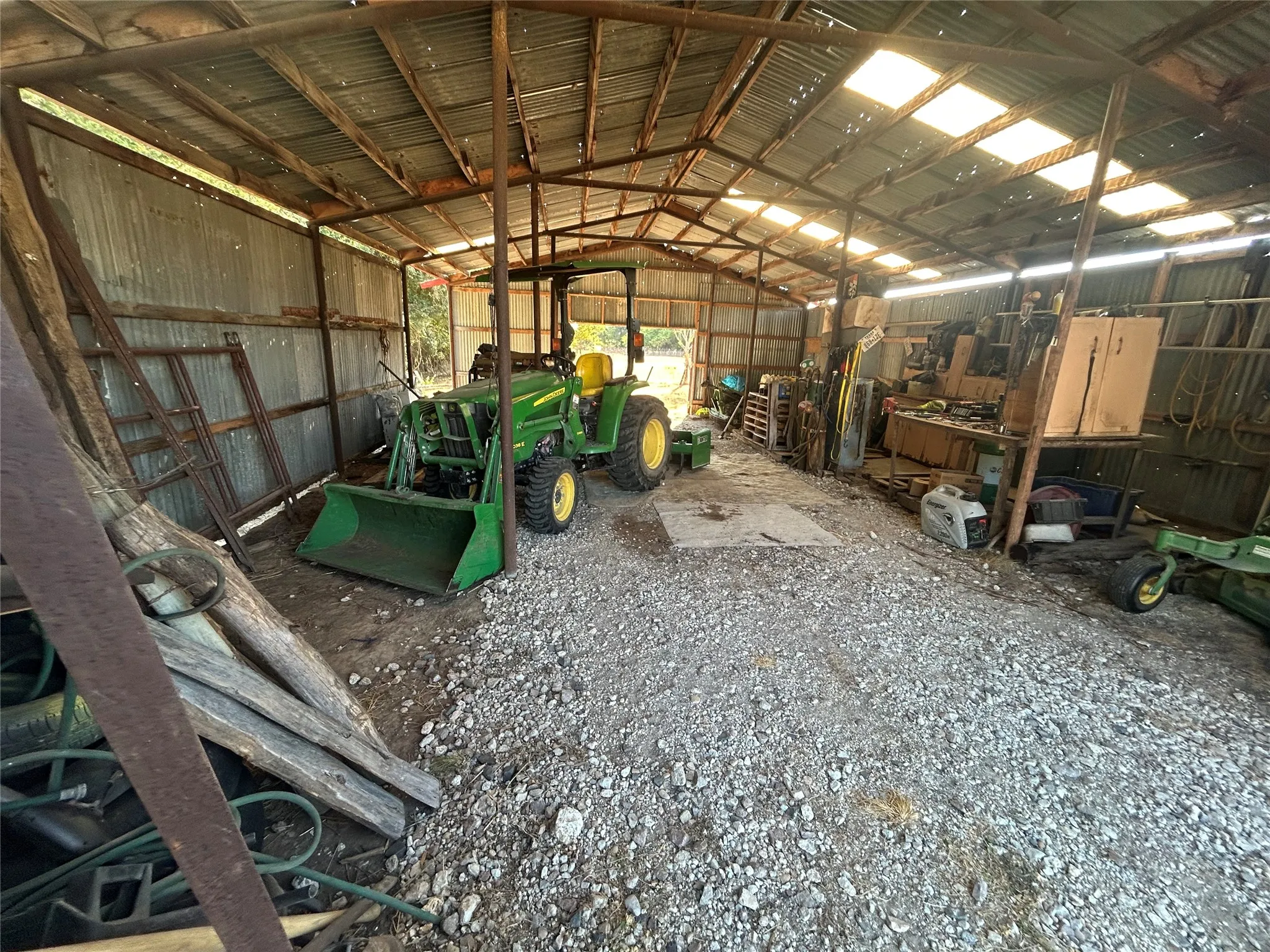 Corrugated metal structure with exposed support beams