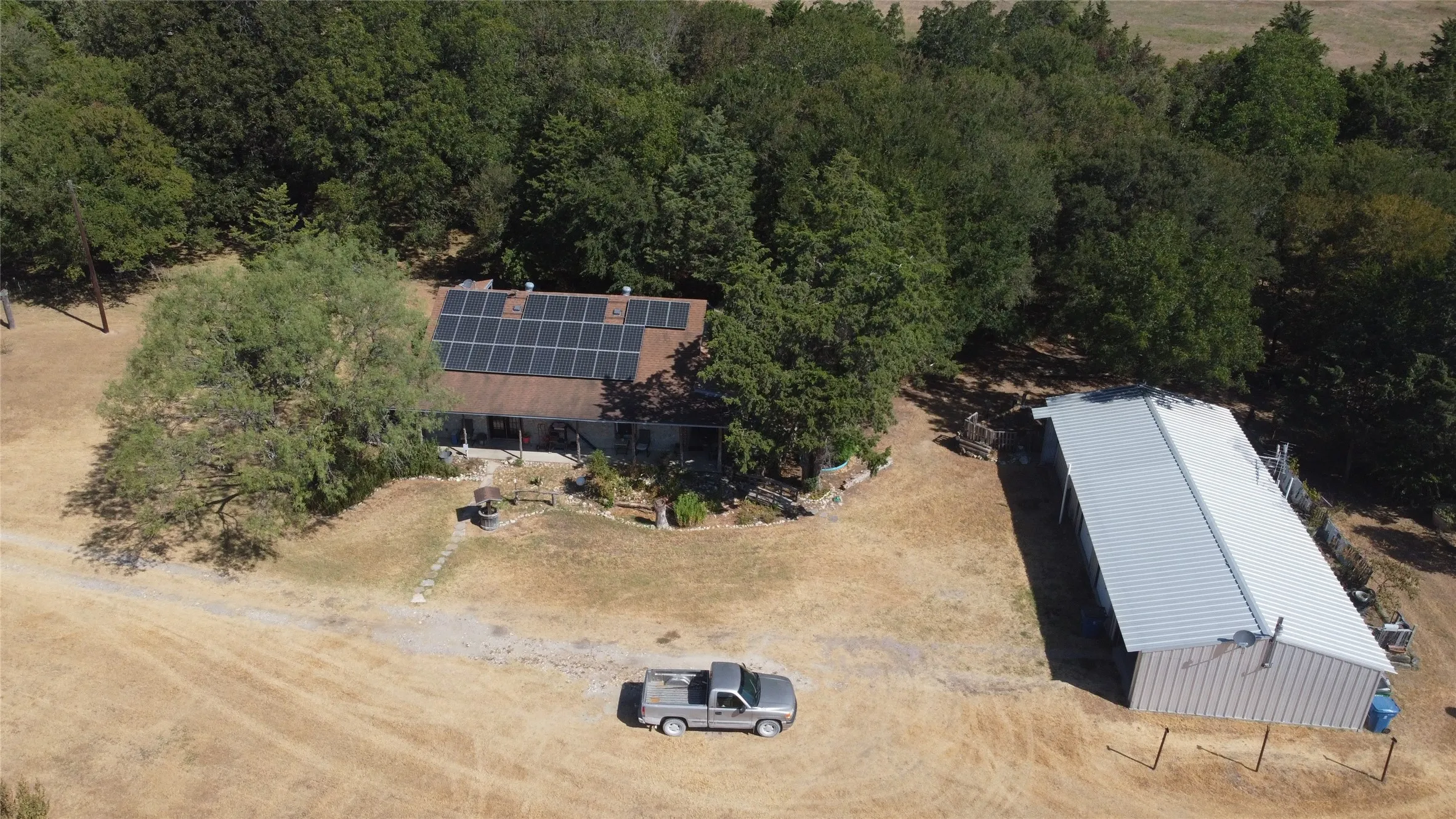 Single-story residence with a covered front porch and solar panel array