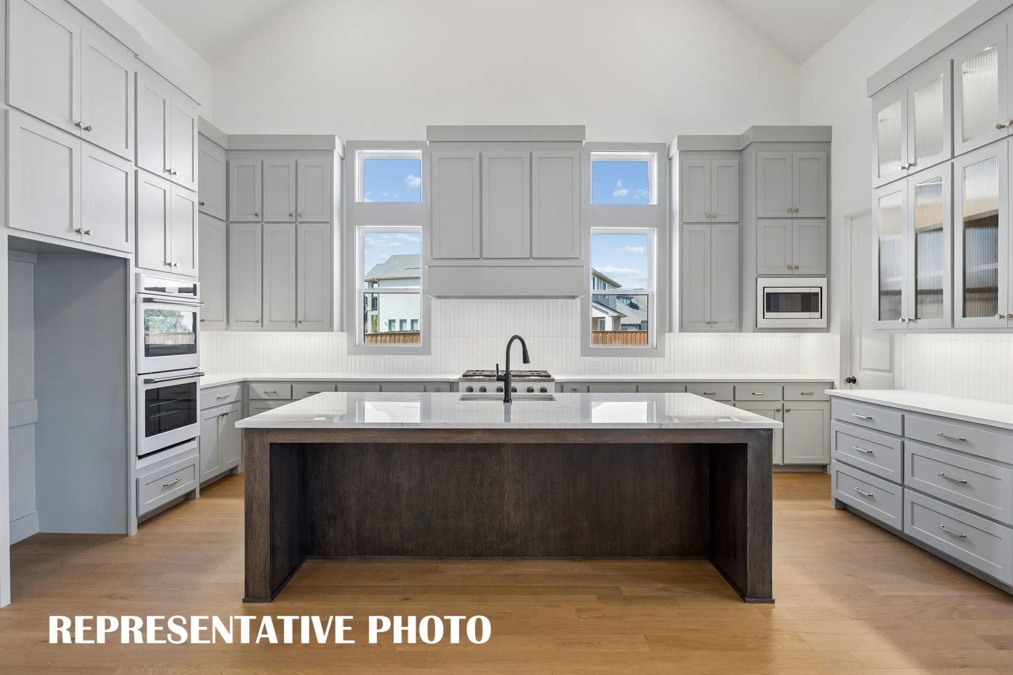 Featuring elegant finishes and space for everything, any chef would be proud to call this dream kitchen their own!  REPRESENTATIVE PHOTO