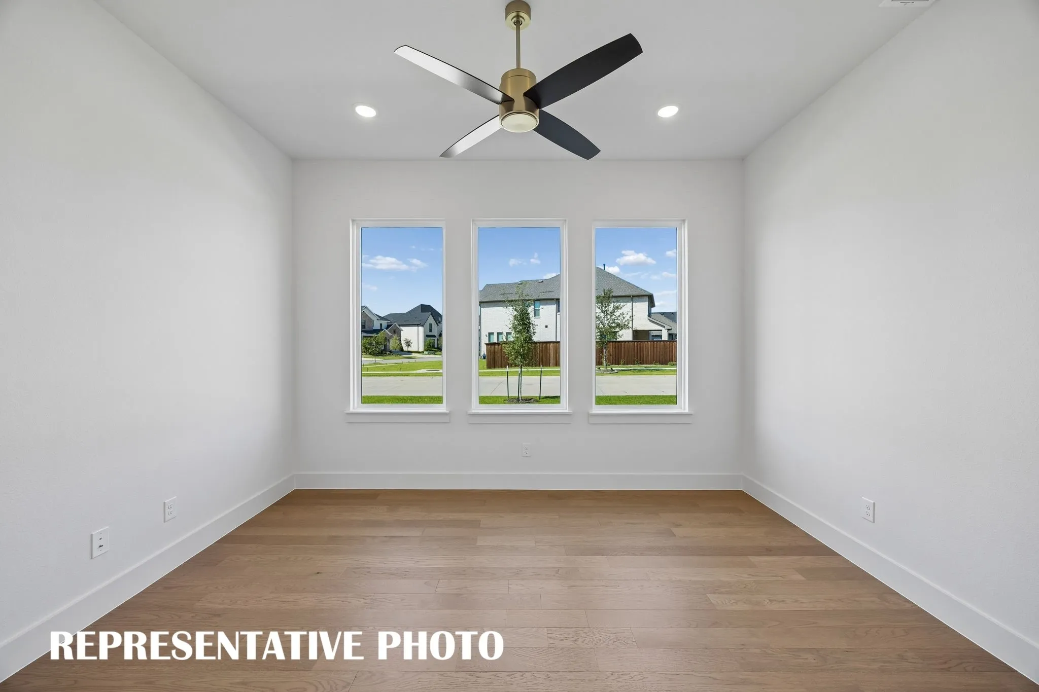 The professional working from home will appreciate this private, light filled home office.  REPRESENTATIVE PHOTO
