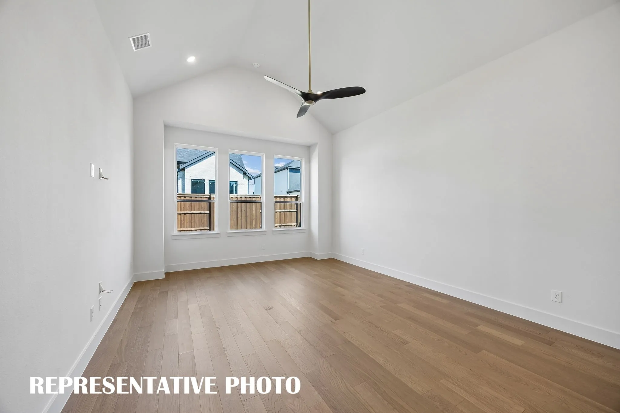 Located at the rear of the home for additional privacy, this dreamy owner's suite was designed for rest and relaxation.  REPRESENTATIVE PHOTO