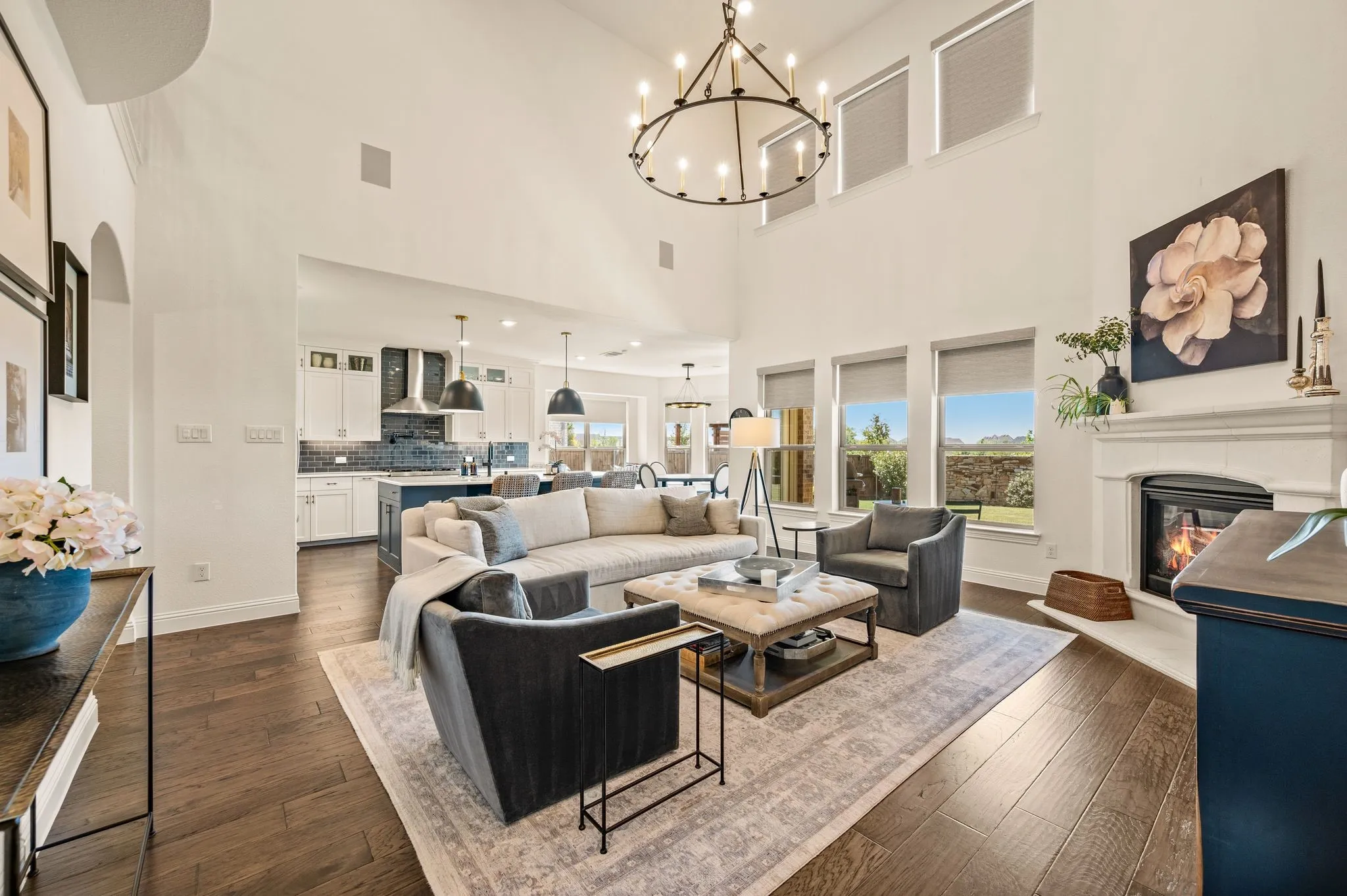 Gorgeous upgrades chandelier+ Bali shades with motorized upper shades.