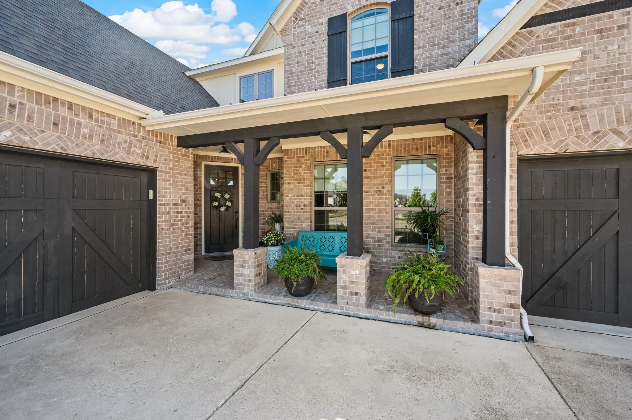 Note: the garage doors were freshly stained after the photo shoot!