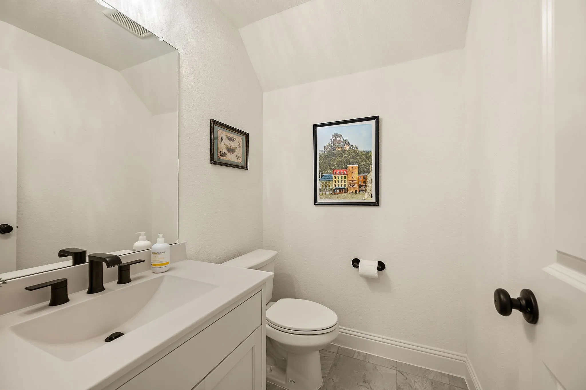 Half bath on second floor near media room
