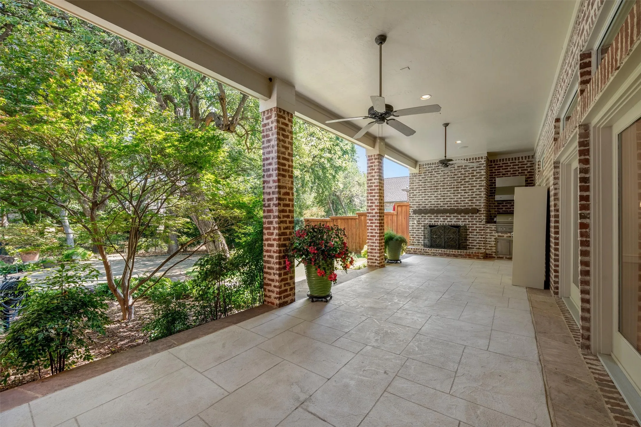 Expansive covered veranda that has fireplace and cooking center. Enjoy the view!
