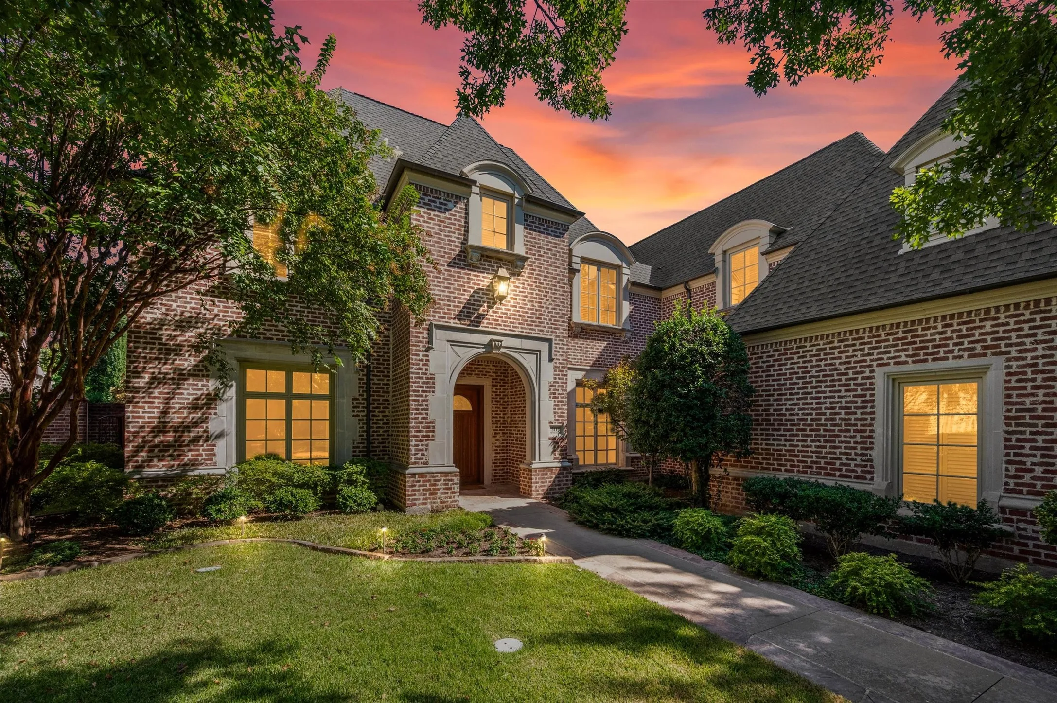 Stately drive up appeal and beautiful traditional windows.