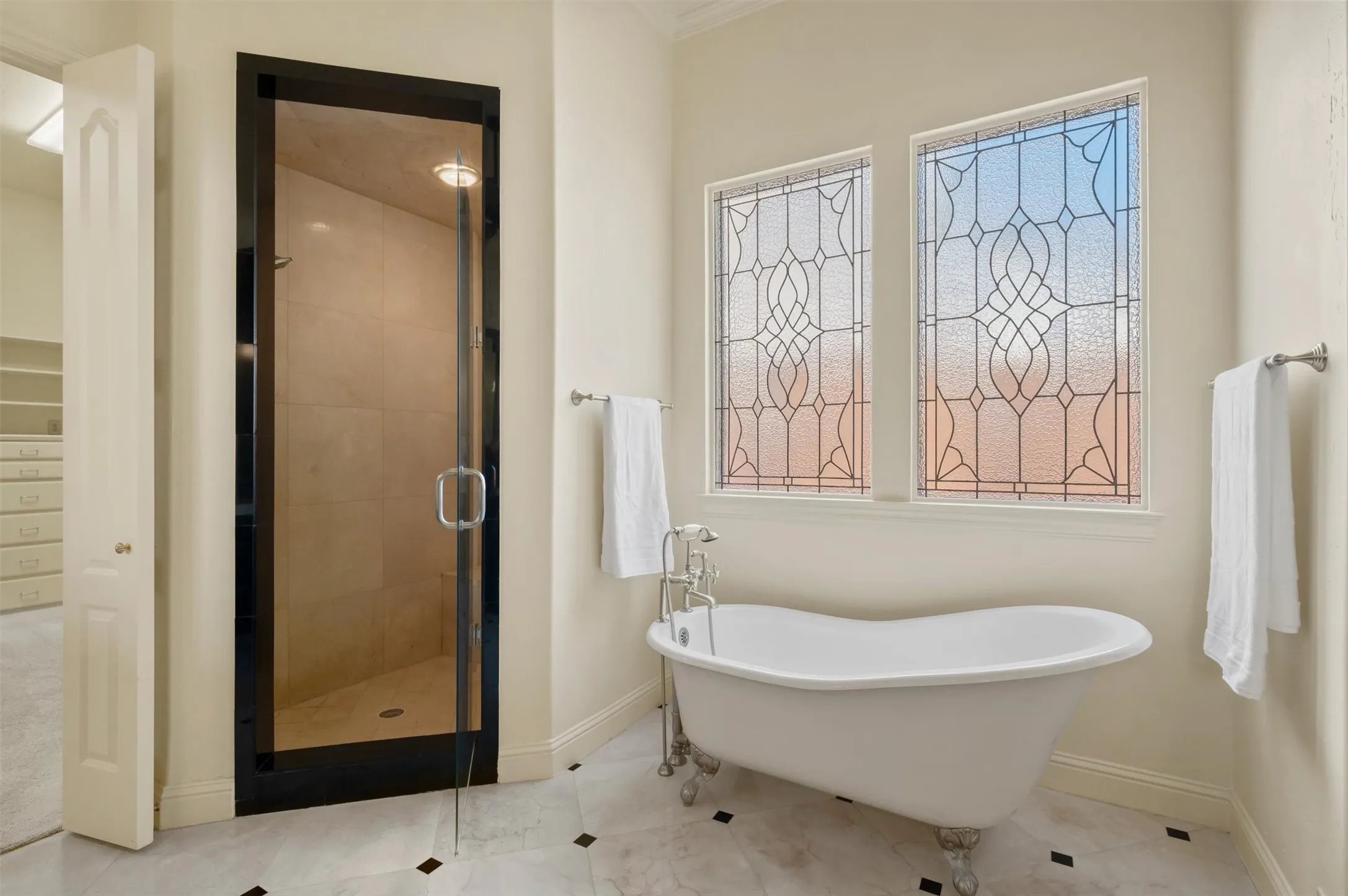 Separate tub and shower.