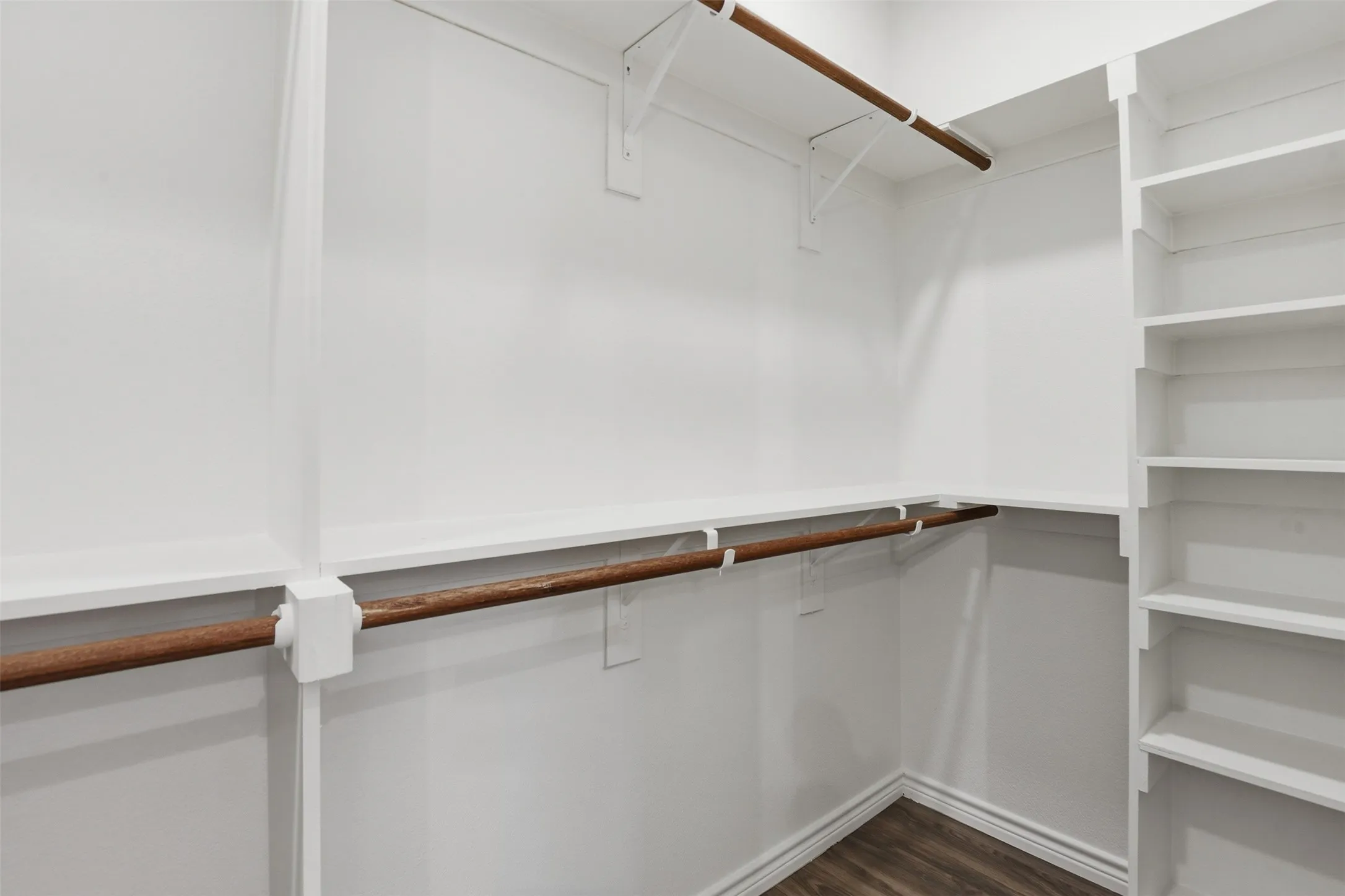 Large Primary closet with storage built in.