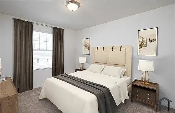 Textured wall-to-wall carpeting, window with blinds, and flush mount lighting