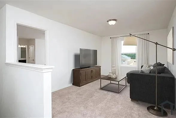 Recessed wall opening with trim, warm neutral wall paint, and overhead flush-mount lighting