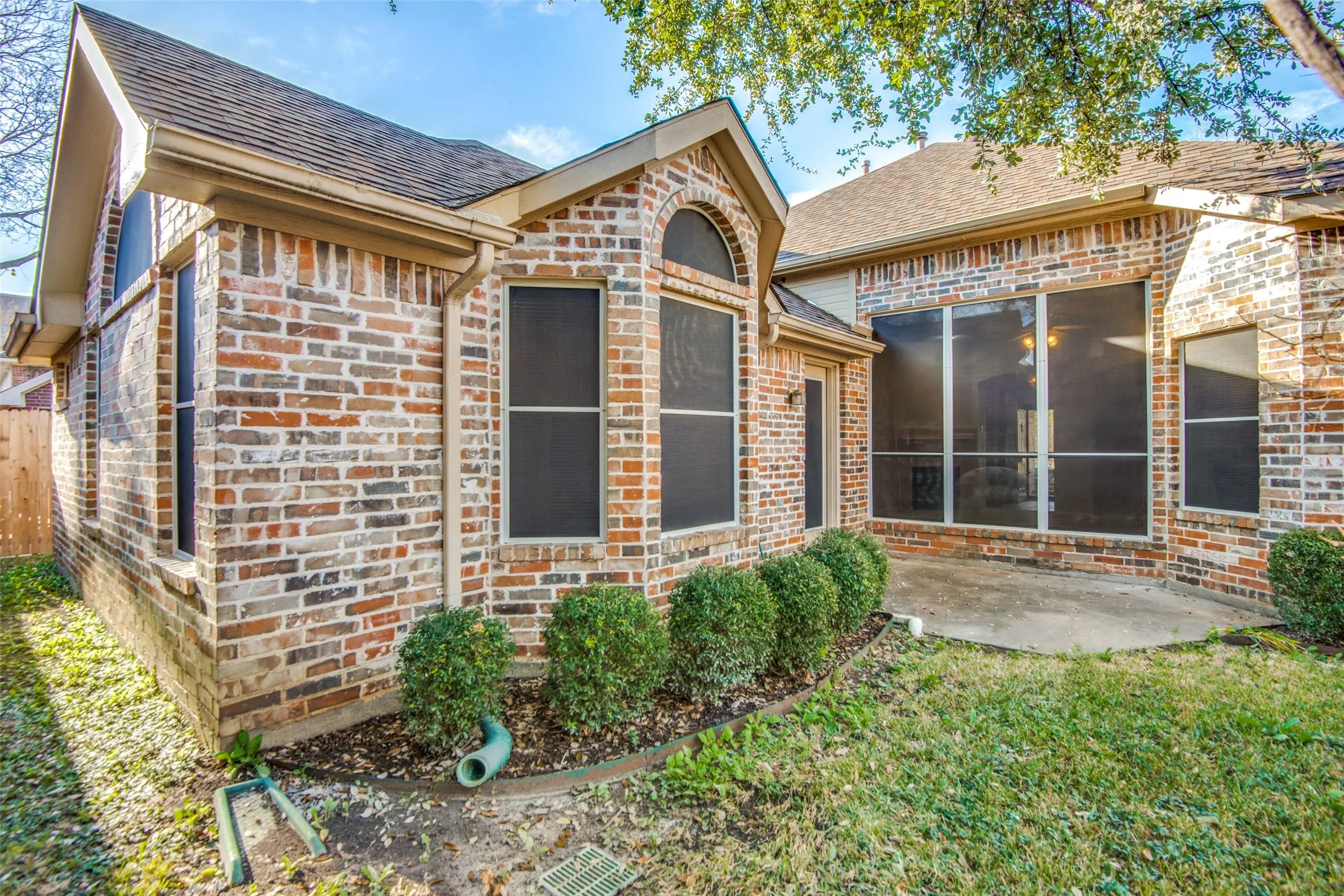 Multi-tone brick exterior with a pitched roof