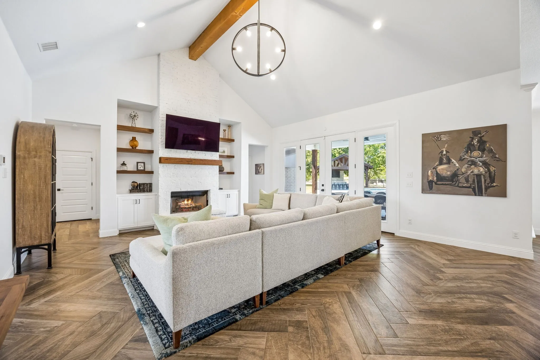 Herringbone floors and wood burning fireplace
