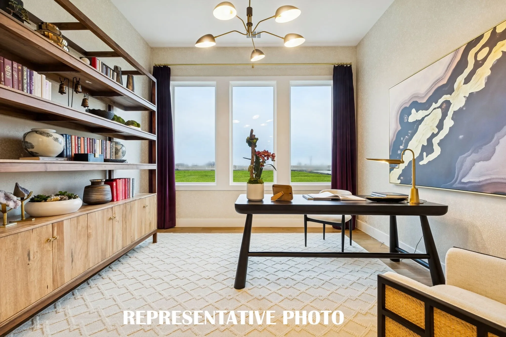 Whether it's working from home or enjoying a good book, you will appreciate this bright and spacious home office.  REPRESENTATIVE PHOTO