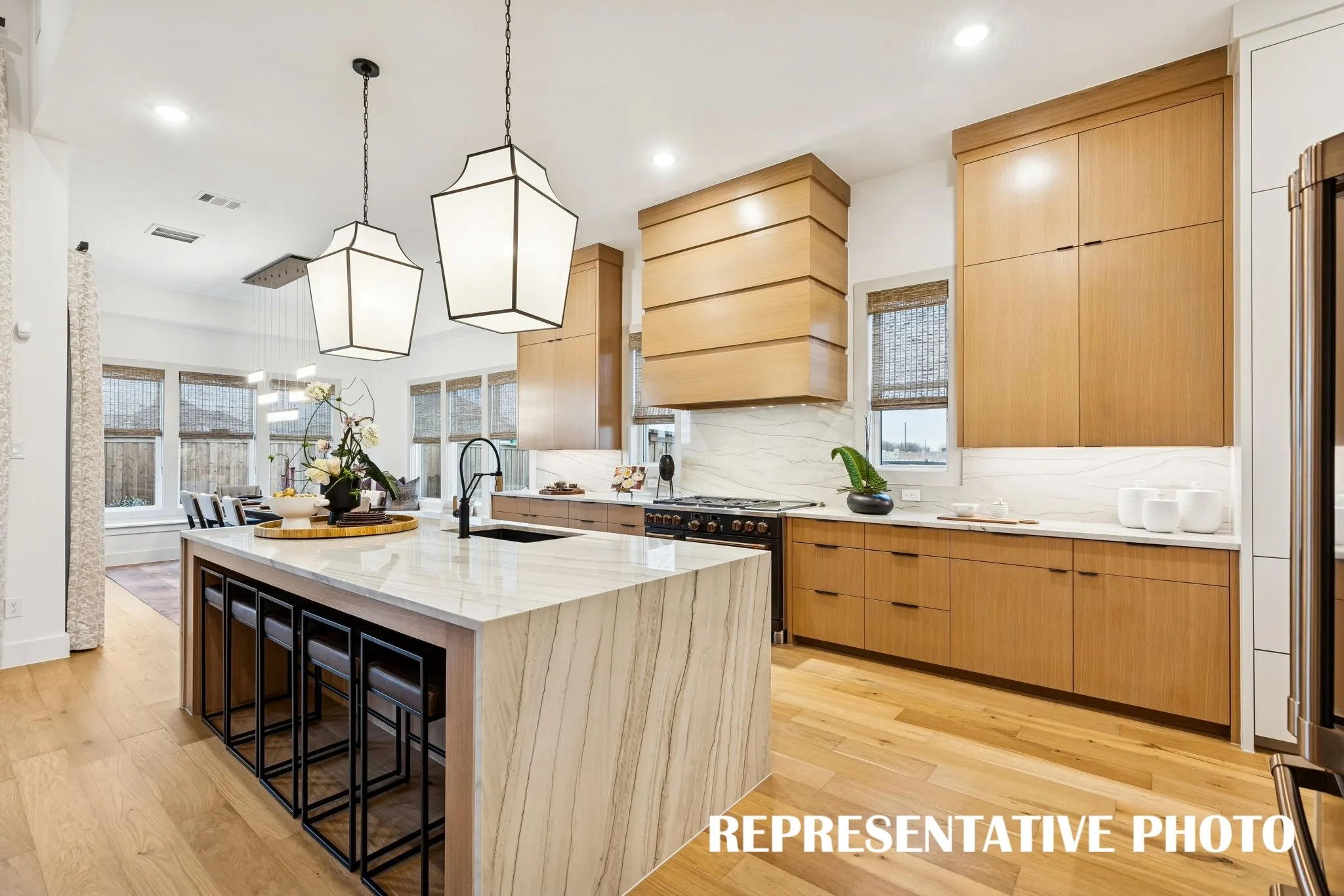 Bold and beautiful, the dream kitchen in our Hayden plan is all that you have dreamed of and more!  REPRESENTATIVE PHOTO