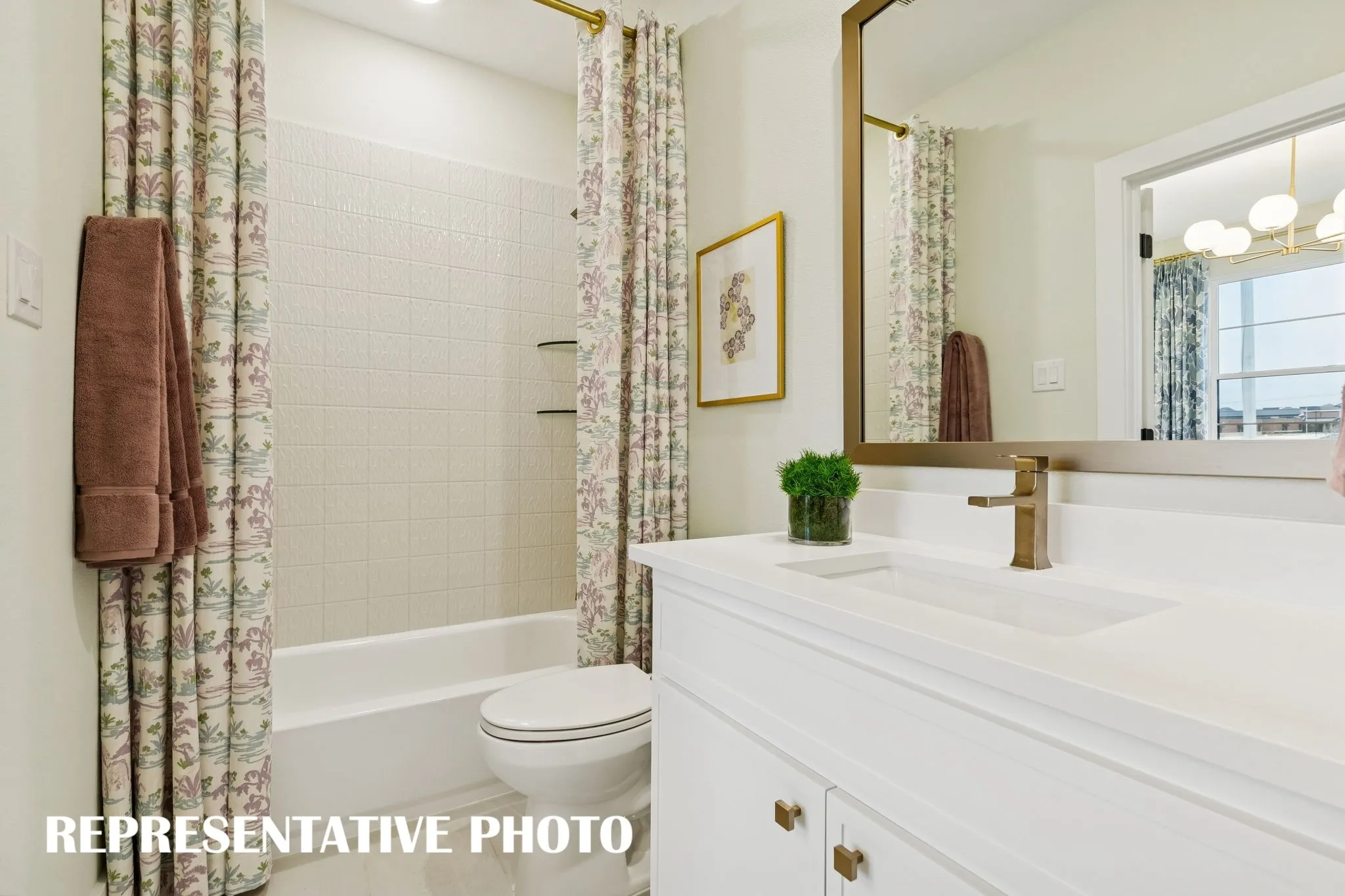Friends and family will feel right at home in any of the beautifully finished guest baths offered in our Hayden plan.  REPRESENTATIVE PHOTO