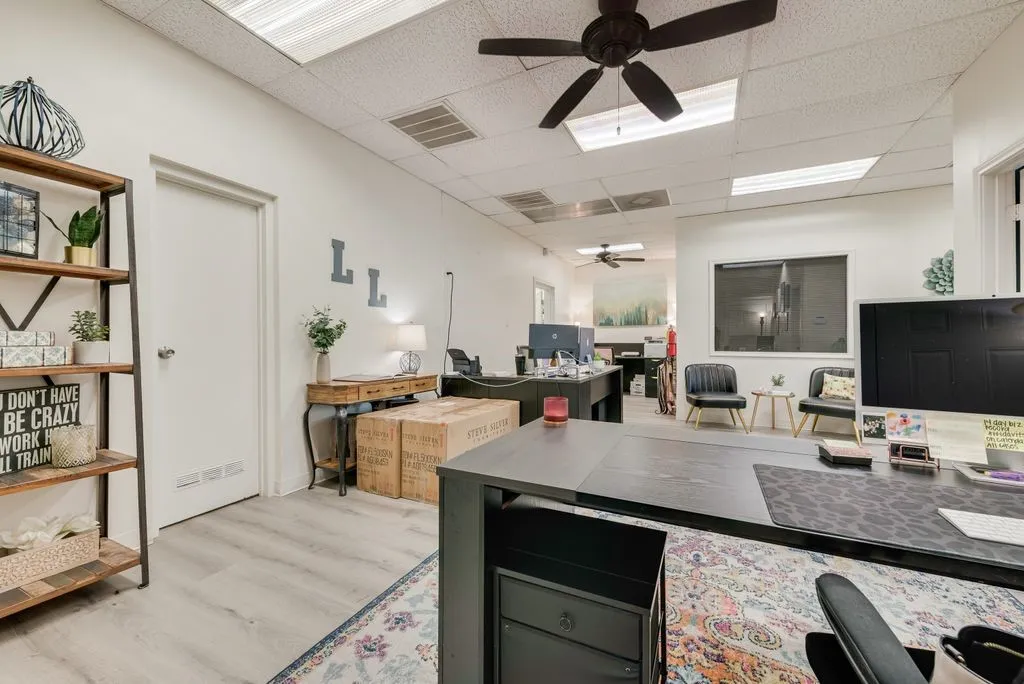 Dropped ceiling with recessed lighting and ceiling fans