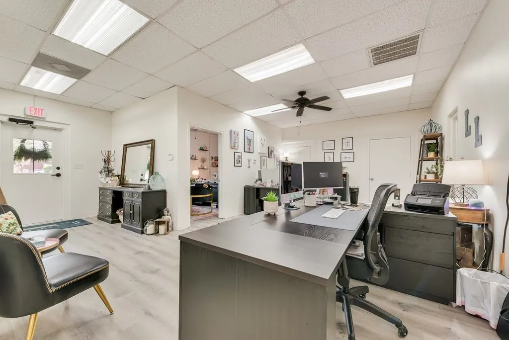 Spacious interior with wood-finish flooring, recessed lighting, and a ceiling fan