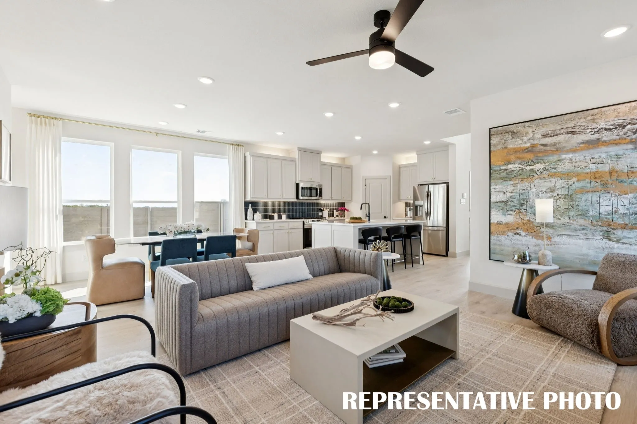 You'll find a family room large enough to host the entire family in our Bella II plan.  REPRESENTATIVE PHOTO