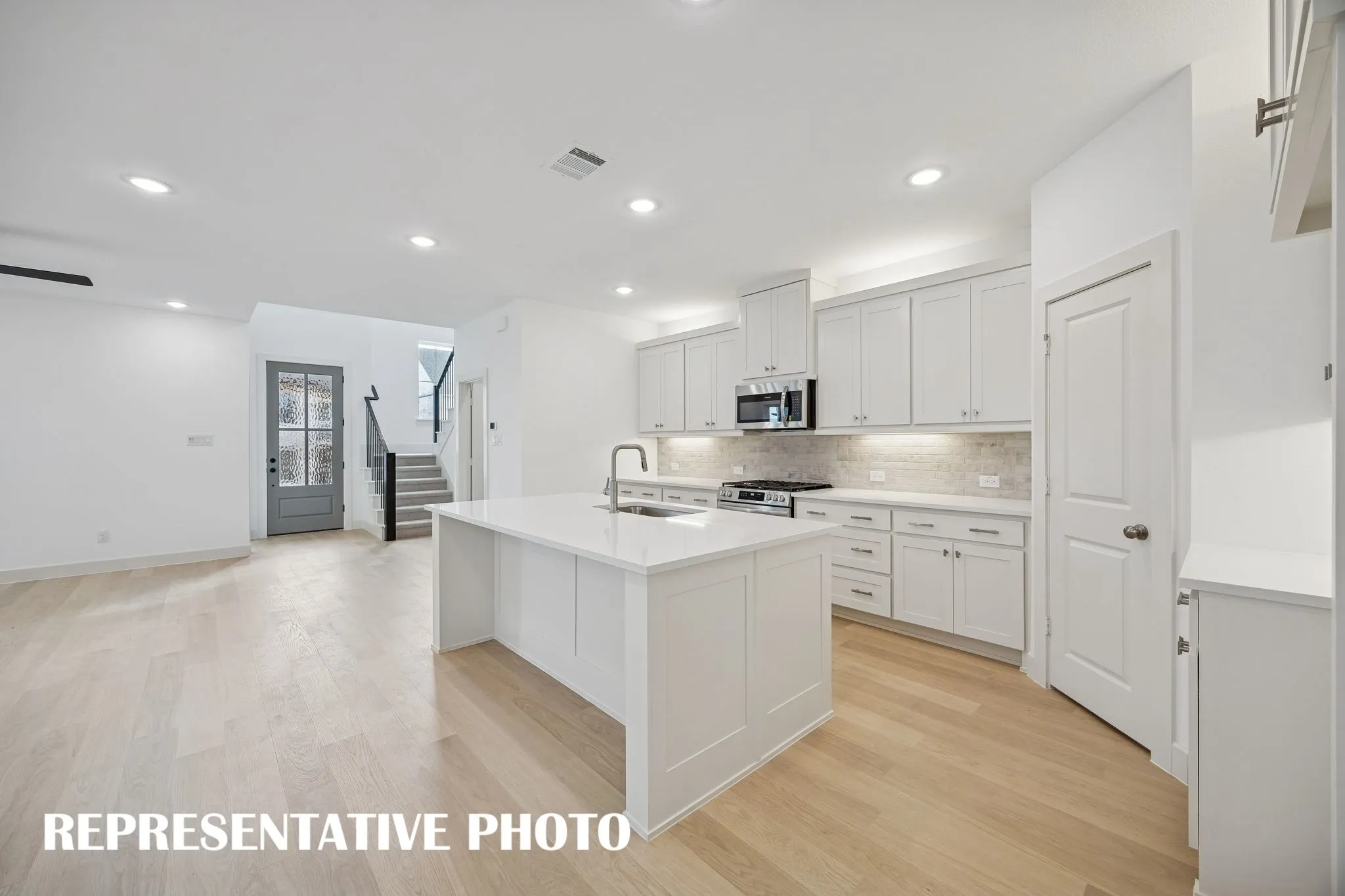 The chef in the family will never be left out of the party in this fantastic floor plan!  REPRESENTATIVE PHOTO