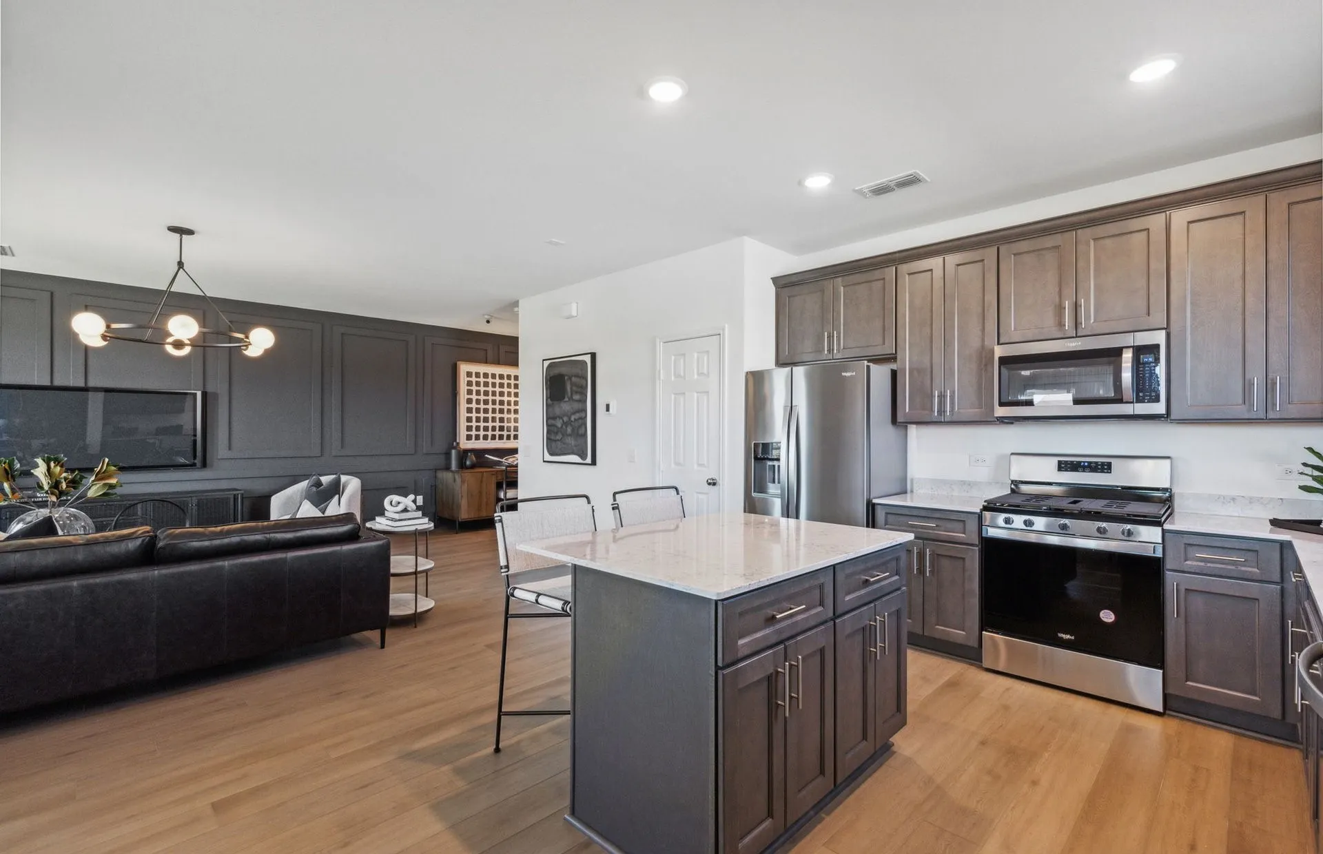*Model Representation - Large island overlooking gathering room and dining areas