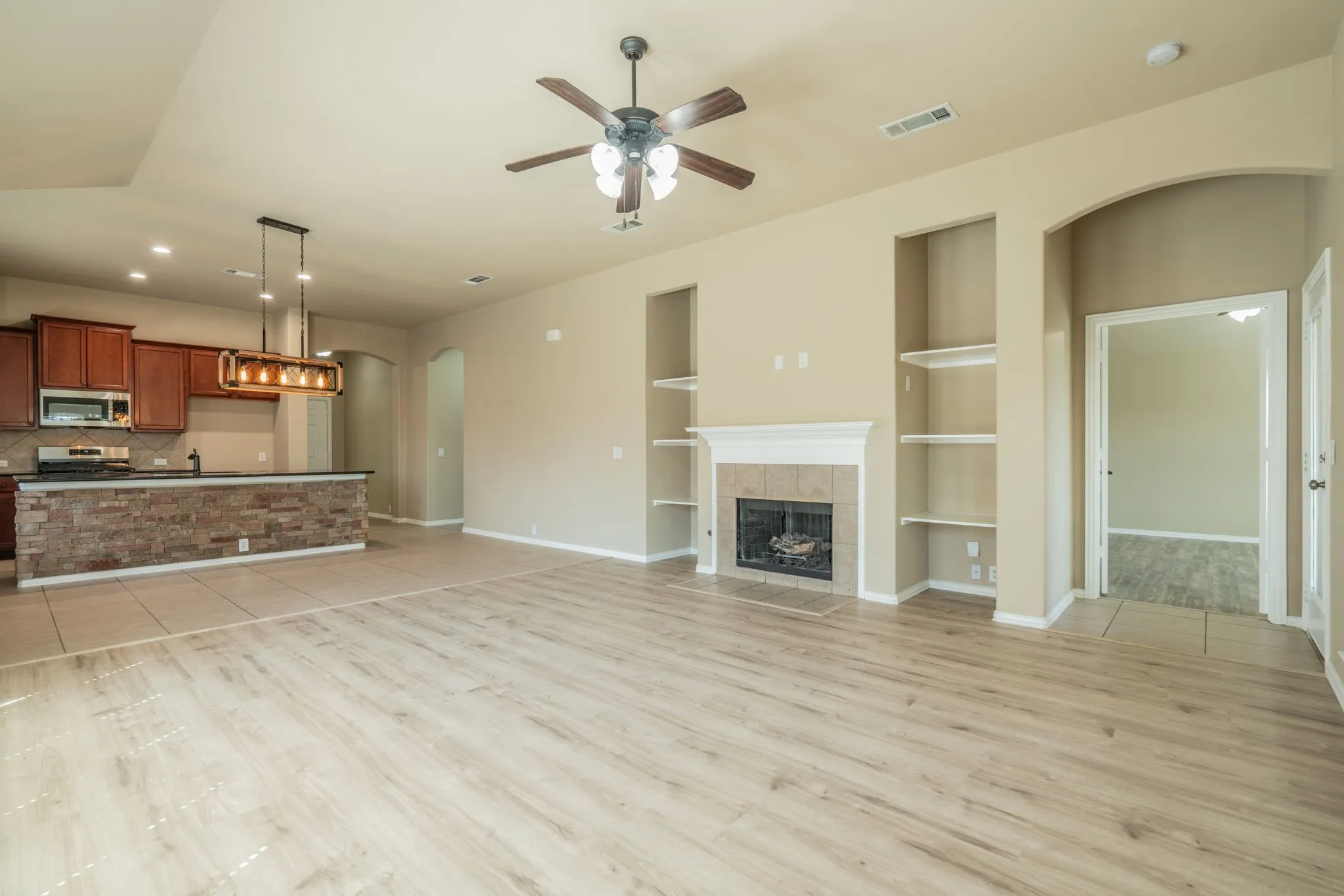 Wood-finish flooring throughout the living area