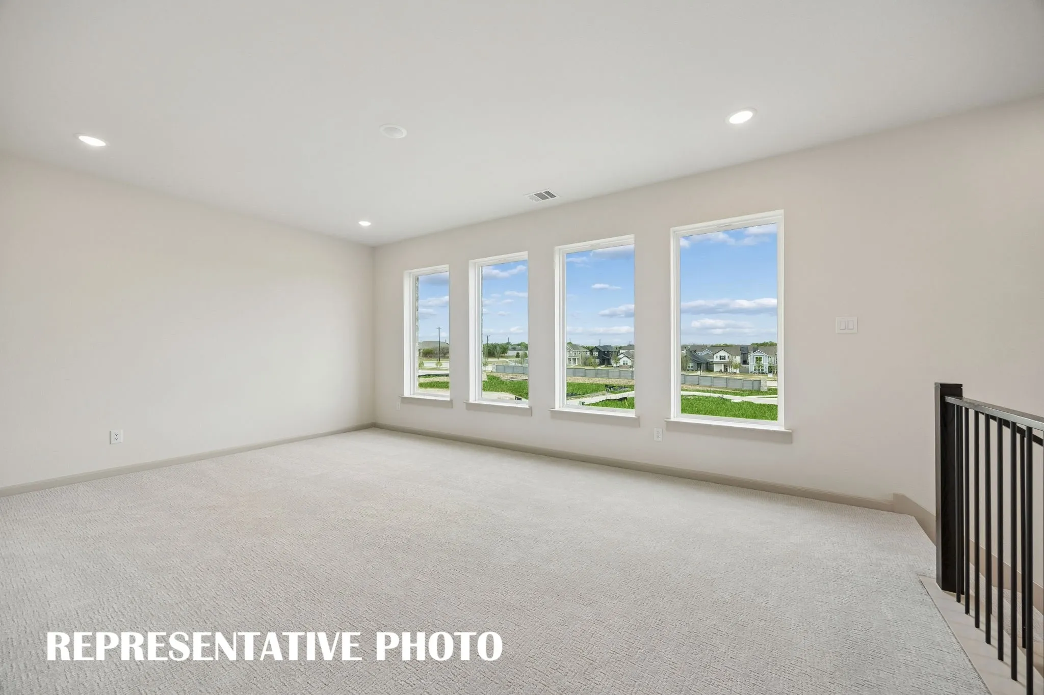 Plenty of family fun time to be had in this light filled game room!  REPRESENTATIVE PHOTO