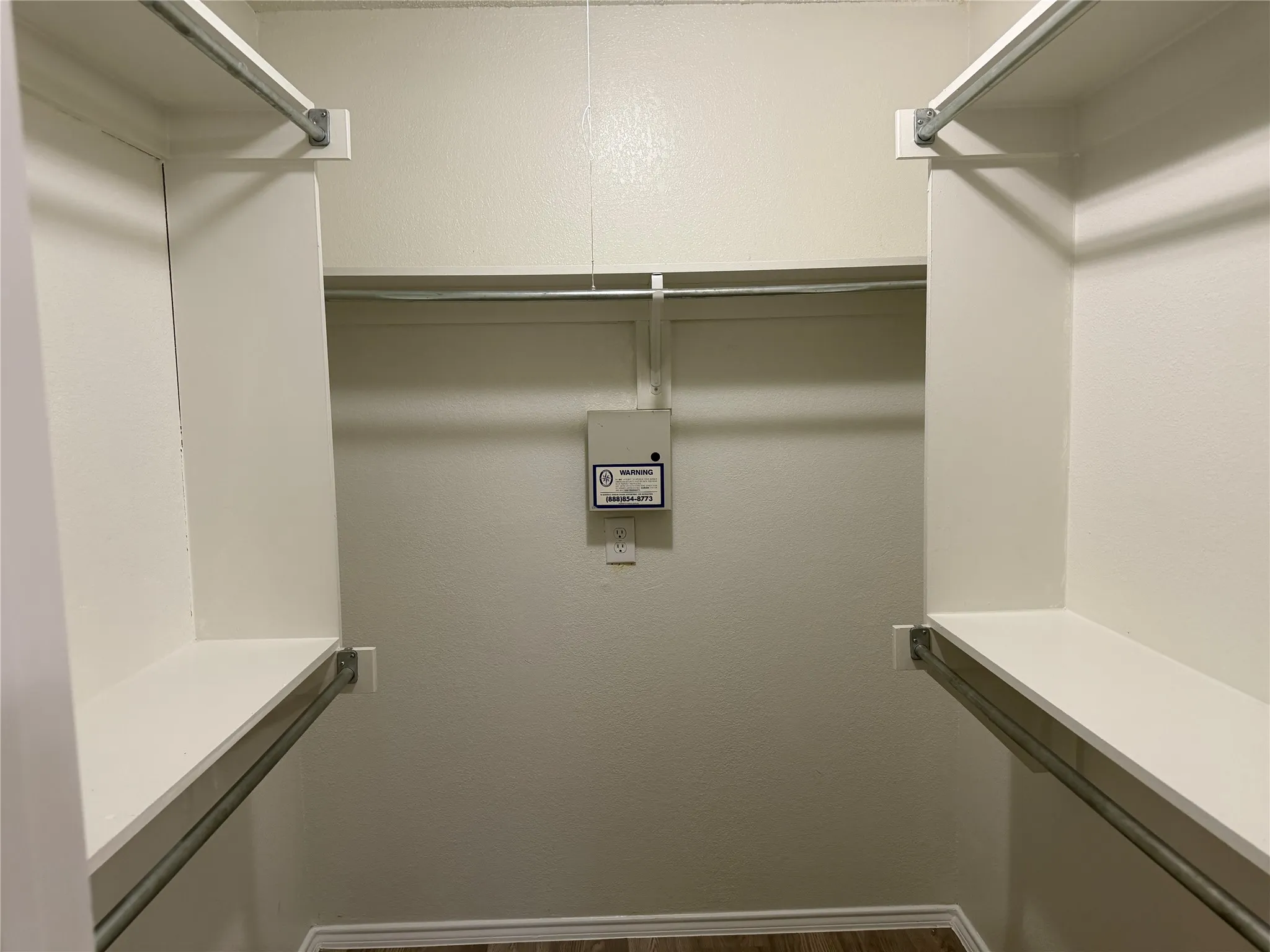 Built-in closet shelving and hanging rods
