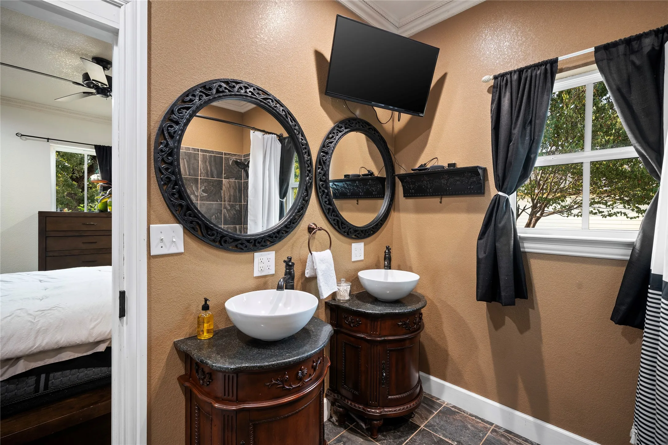 Dual vessel sinks with individual wood-finish vanities