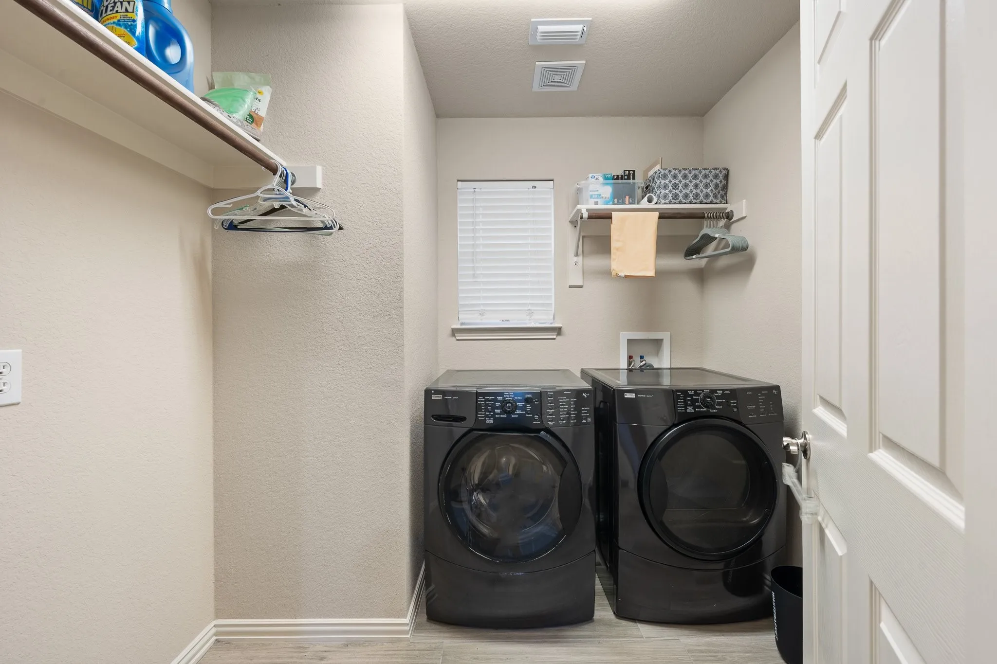 The laundry room has room to hang your clothes, too!
