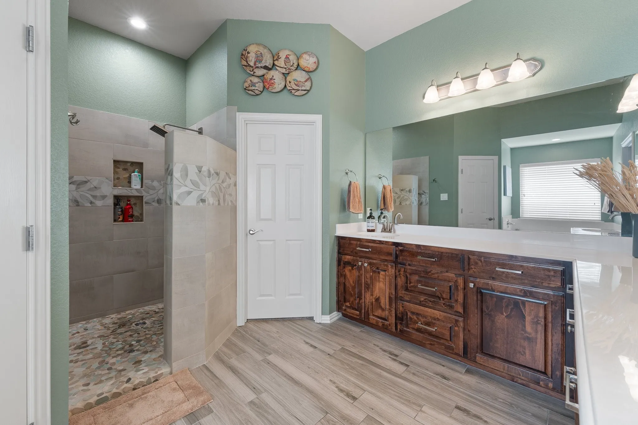 The primary bathroom was recently remodeled and you'll LOVE the walk in shower!